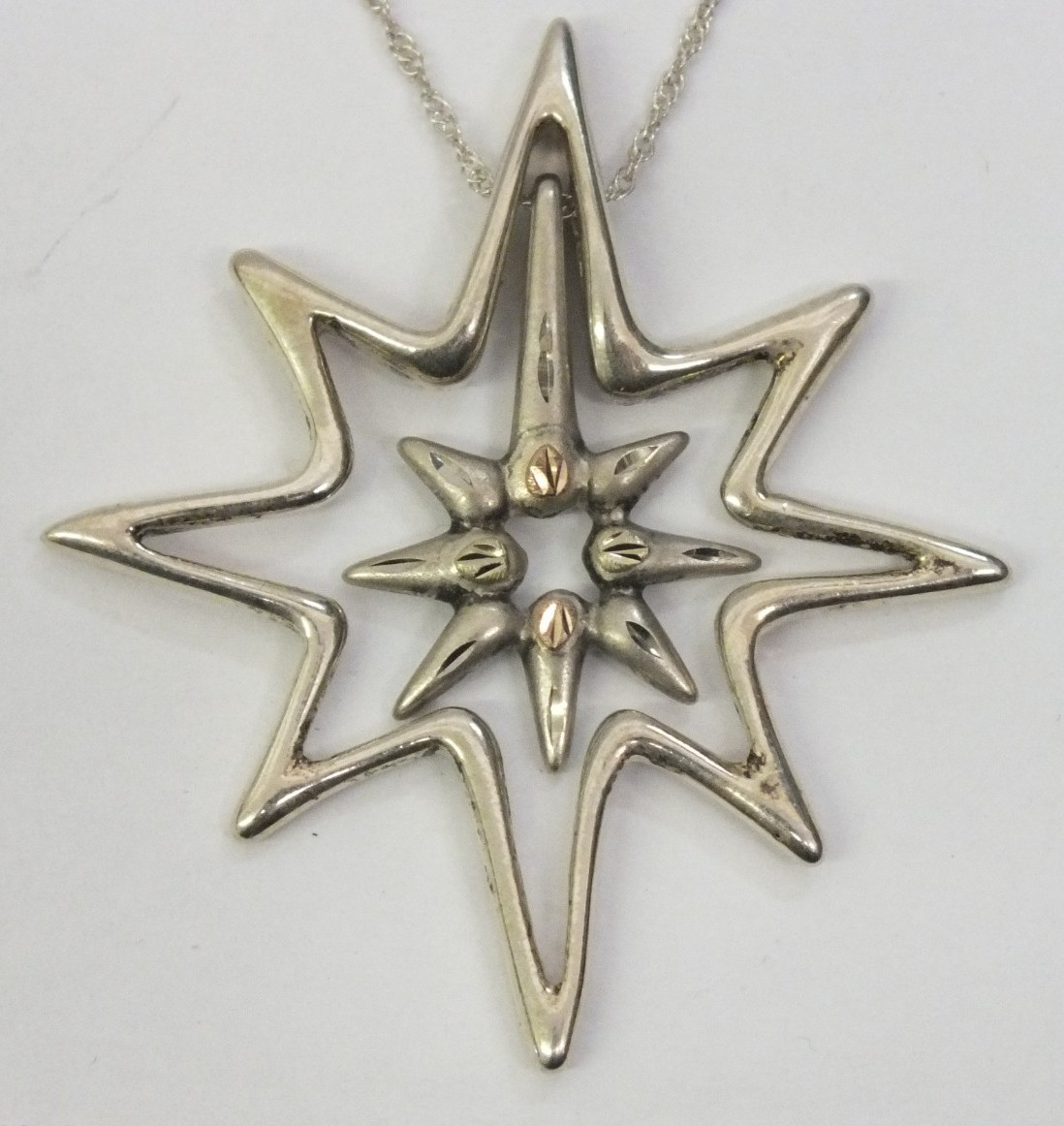 Landstrom’s Black Hills Gold Sterling Silver & 12K Gold Star Necklace w/ chain