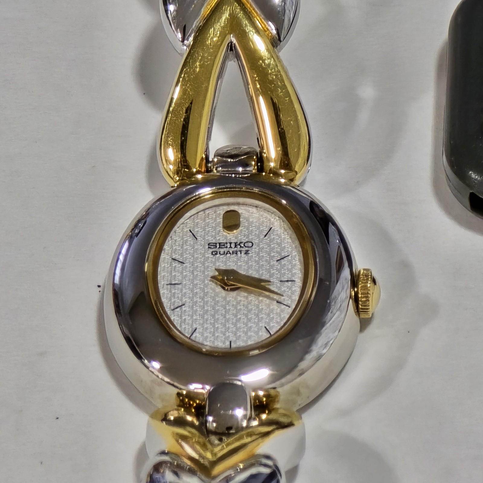 Seiko Women’s Quartz Two-Tone Heart Link Bracelet Watch, Silver Dial