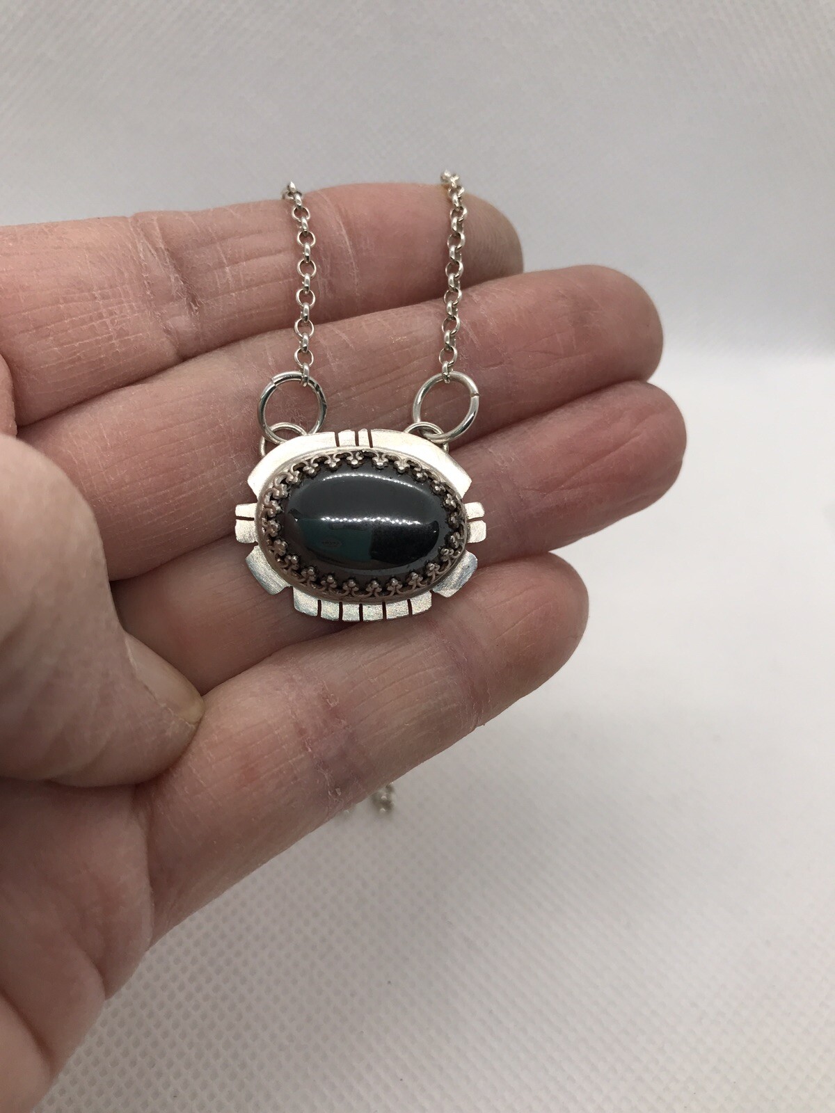 Hematite Pendant In Sterling Silver 18” Chain