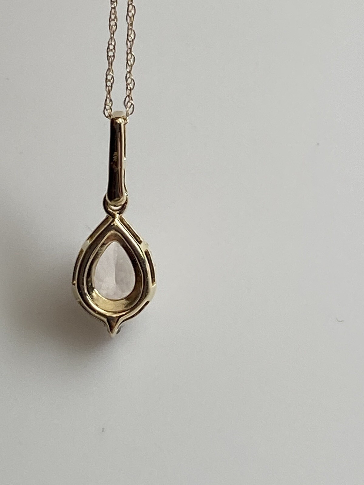 10K Yellow Gold Pear Shape Morganite and 0.11ct twt. Diamond Pendant with Chain