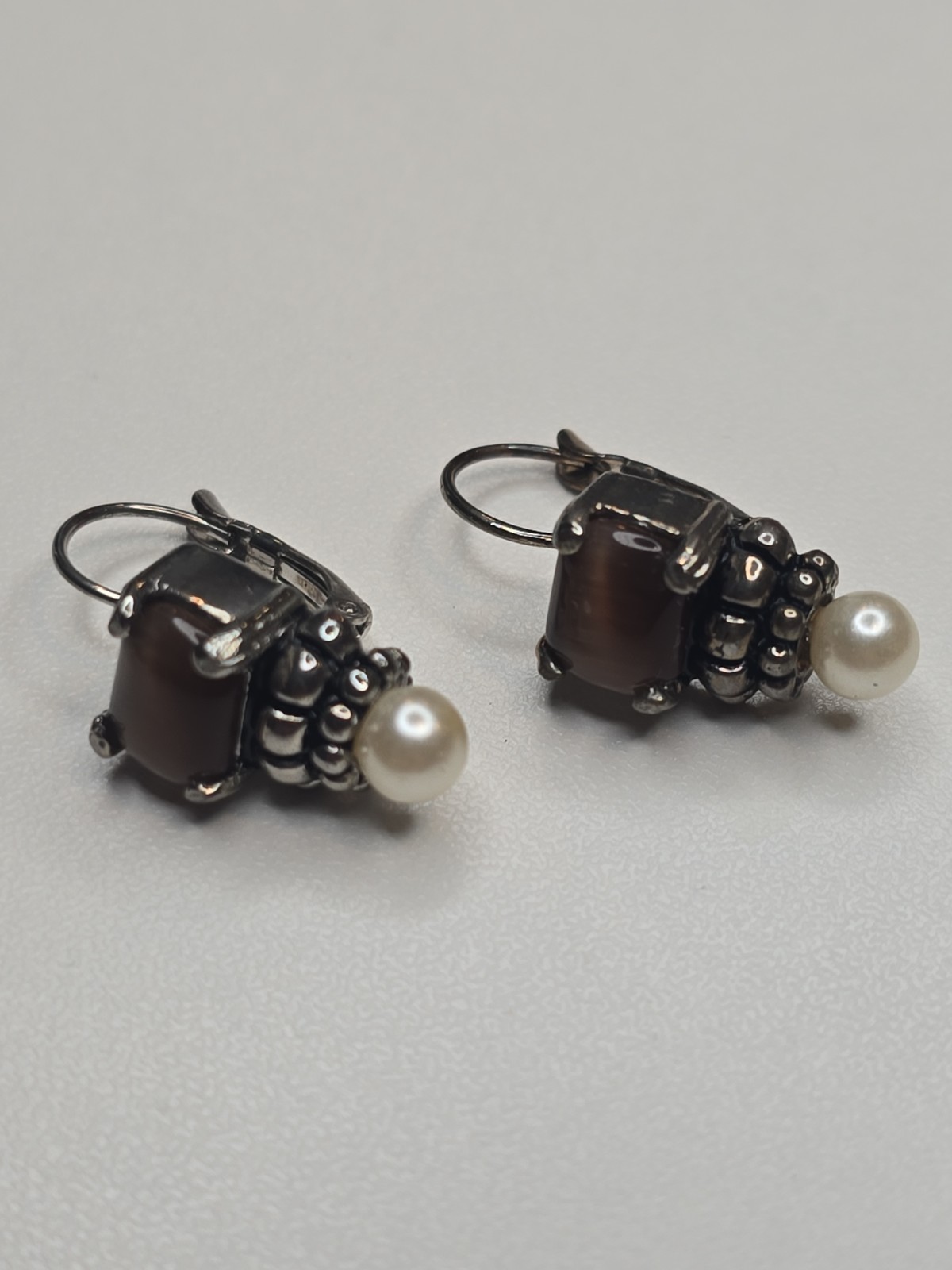 sterling silver Lagos earrings, smoky quartz stone and pearl accent.