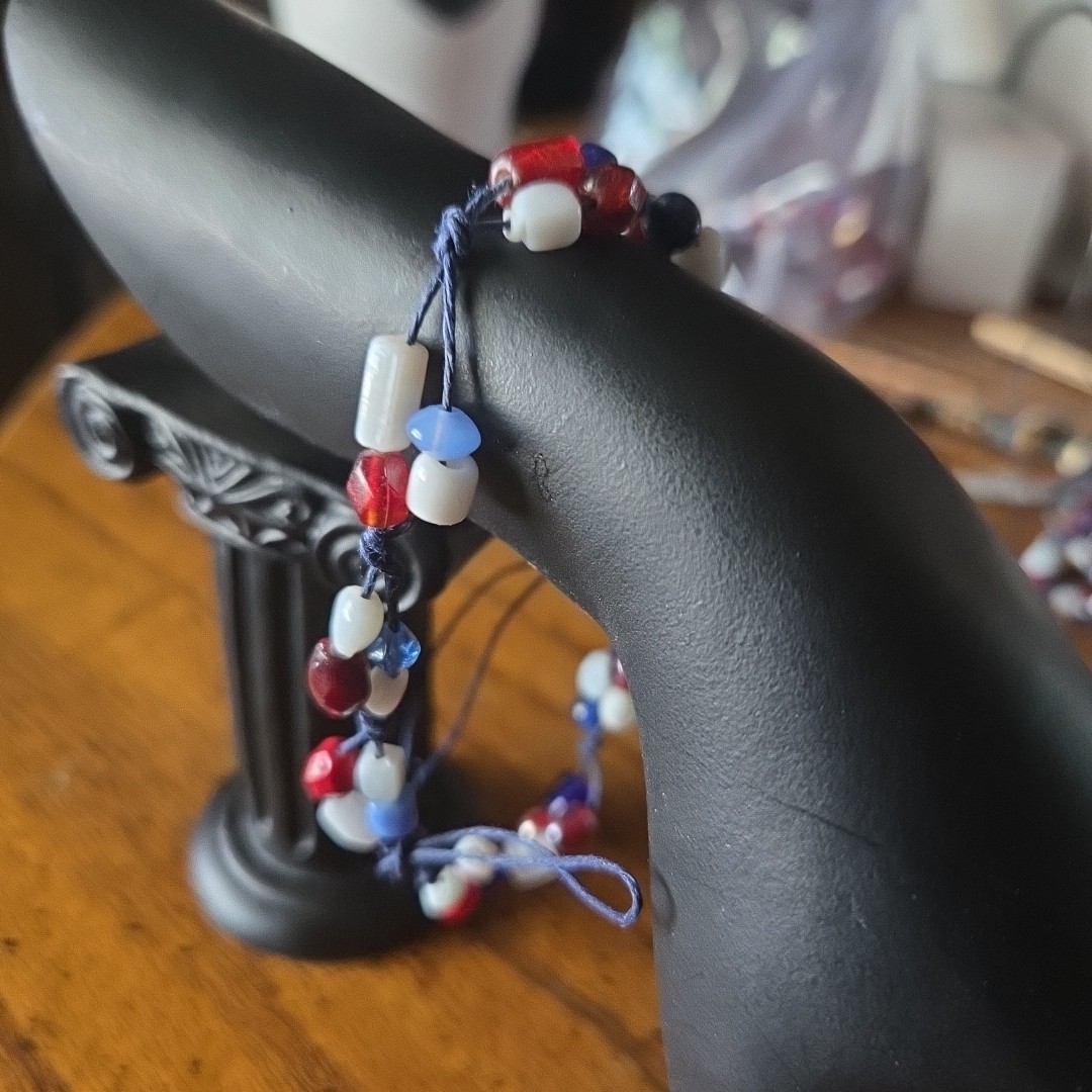 Patriotic red white & blue 7 inch bracelet. Size is adjustable Tie one