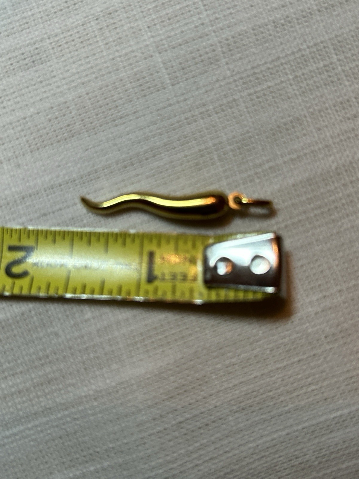 18k solid gold Italian horn weight is 1.2gr. includes 28″ 18K gold Neckless