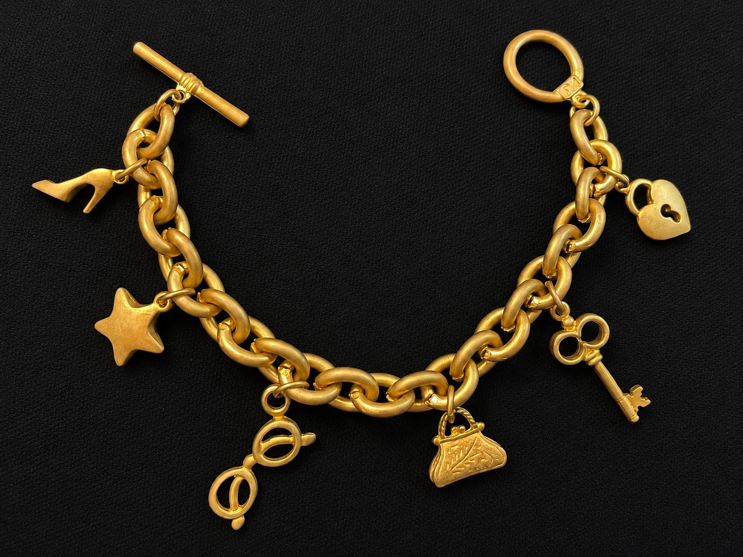 Victorias Secret Signed VS Charm Bracelet Gold Tone Link Chain Toggle Vintage