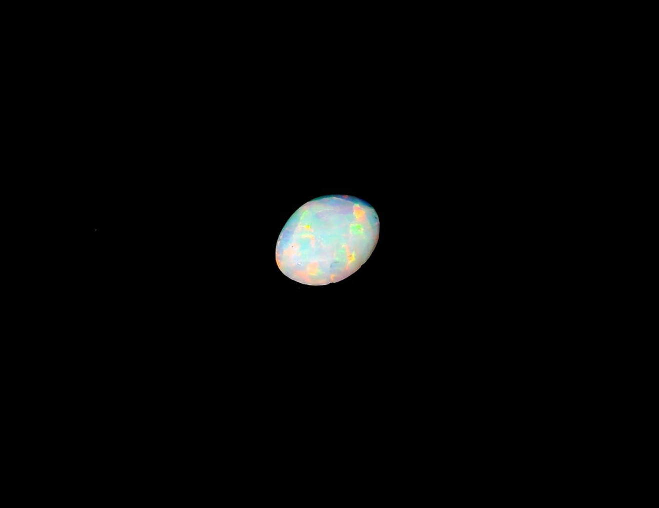0.36ct Oval Shape White Blue Multi-Color Opal 7 x 5 mm