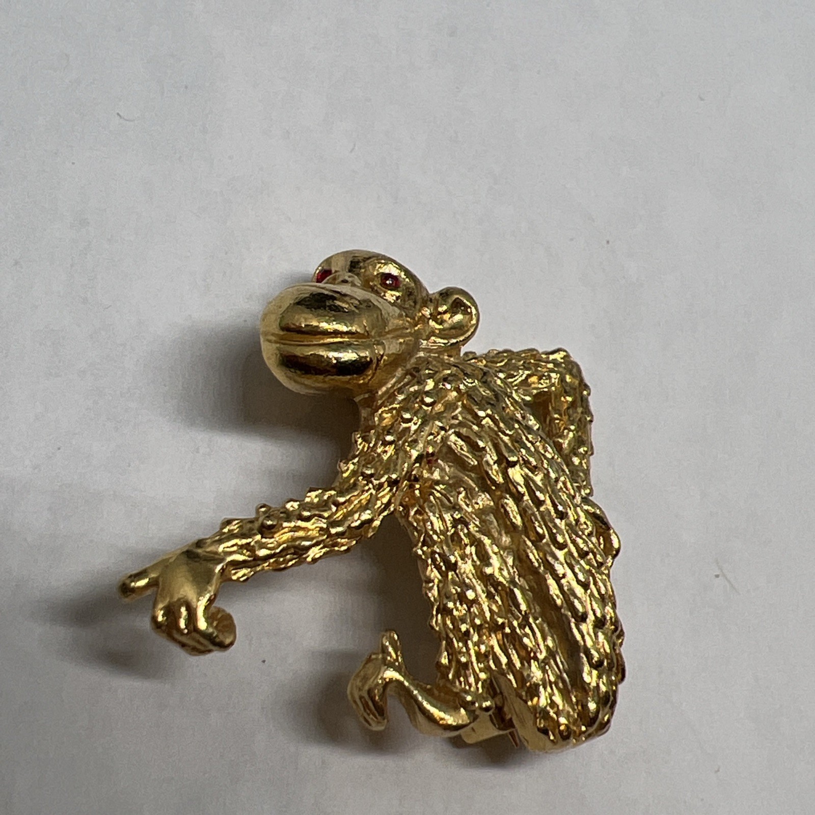 Vintage Signed Gerry’s Gold Tone Monkey Ape Figural Brooch Textured Red Rhinesto