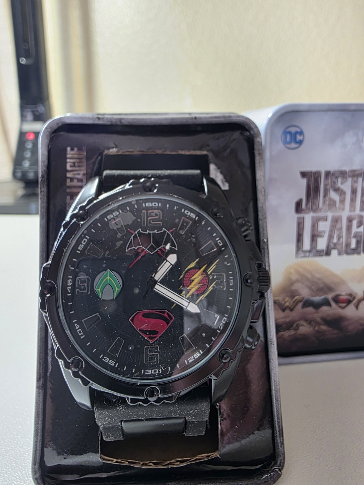 DC Justice League Men’s Quartz Analog Watch Black Silicone Band w/ Tin Case