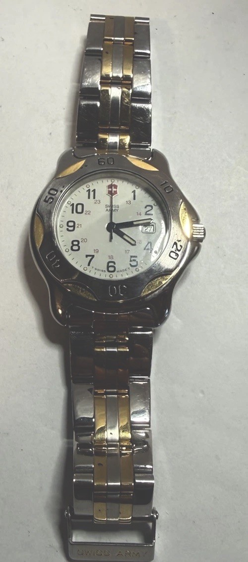 VINTAGE QUARTZ WOMENS AUTHENTIC SWISS ARMY DATE WRISTWATCH FRESH BATTERY