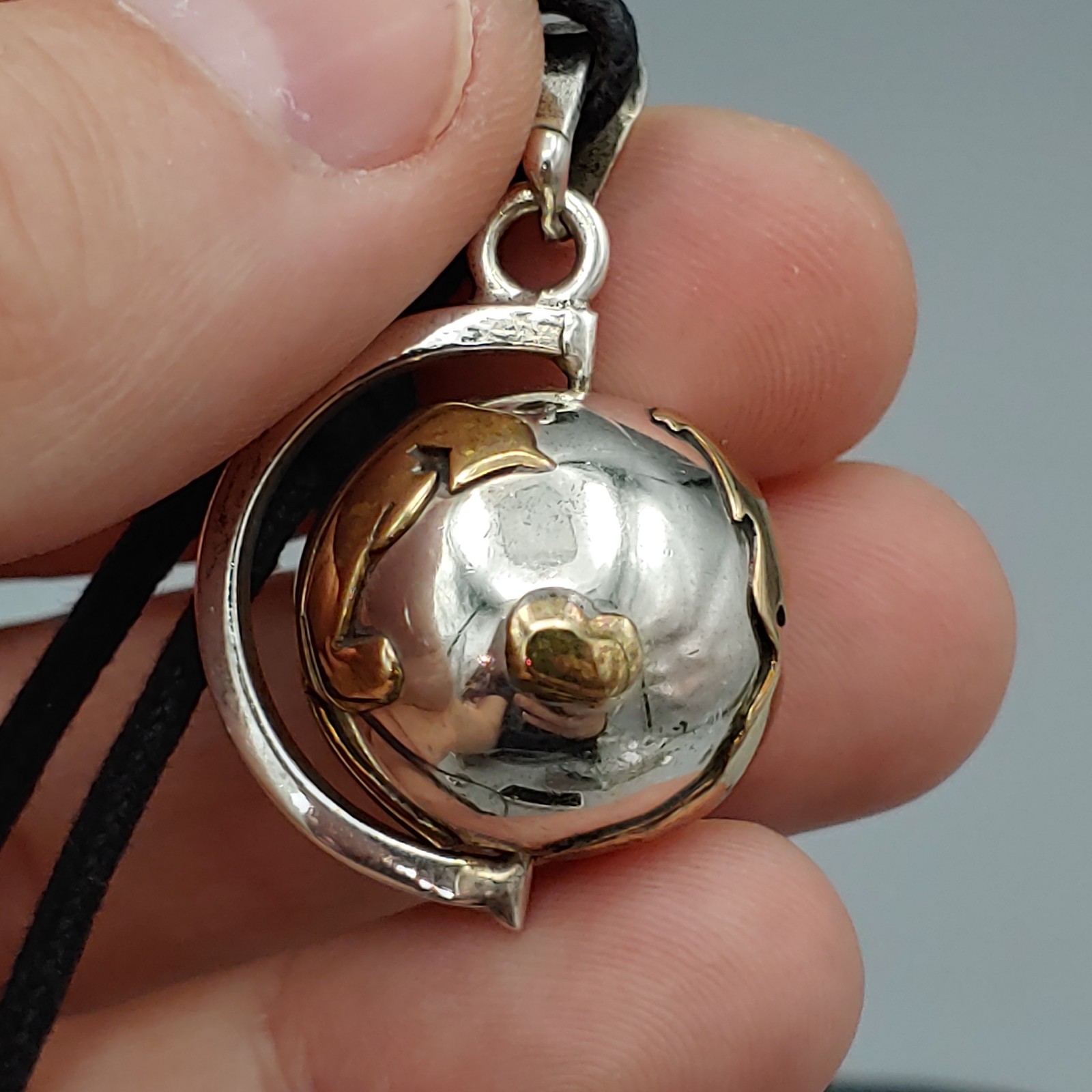VTG Taxco TR-77 Mexico Sterling Silver .925 and Brass Earth Harmony Spin Pendant