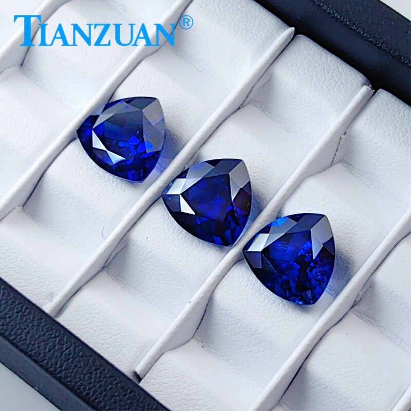 Lab Created Trillion shape Royal Blue Sapphire loose gemstone with Inclusions