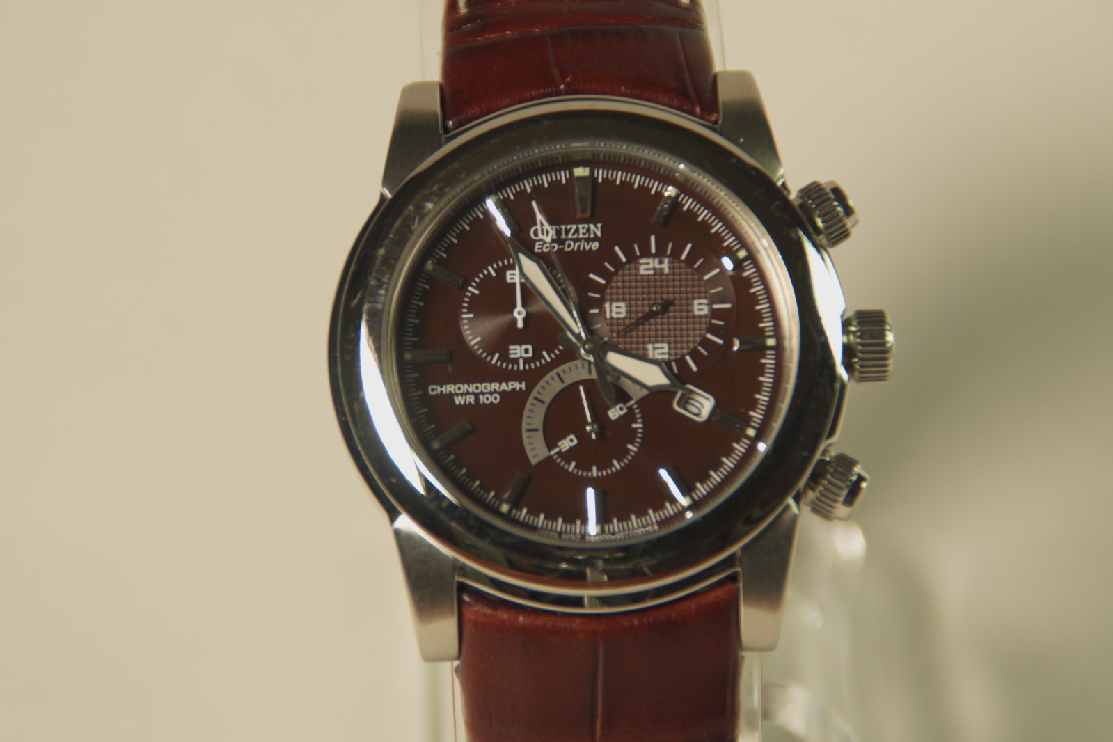 citizen eco-drive mens watch brown face, brown leather strap w/white stitching