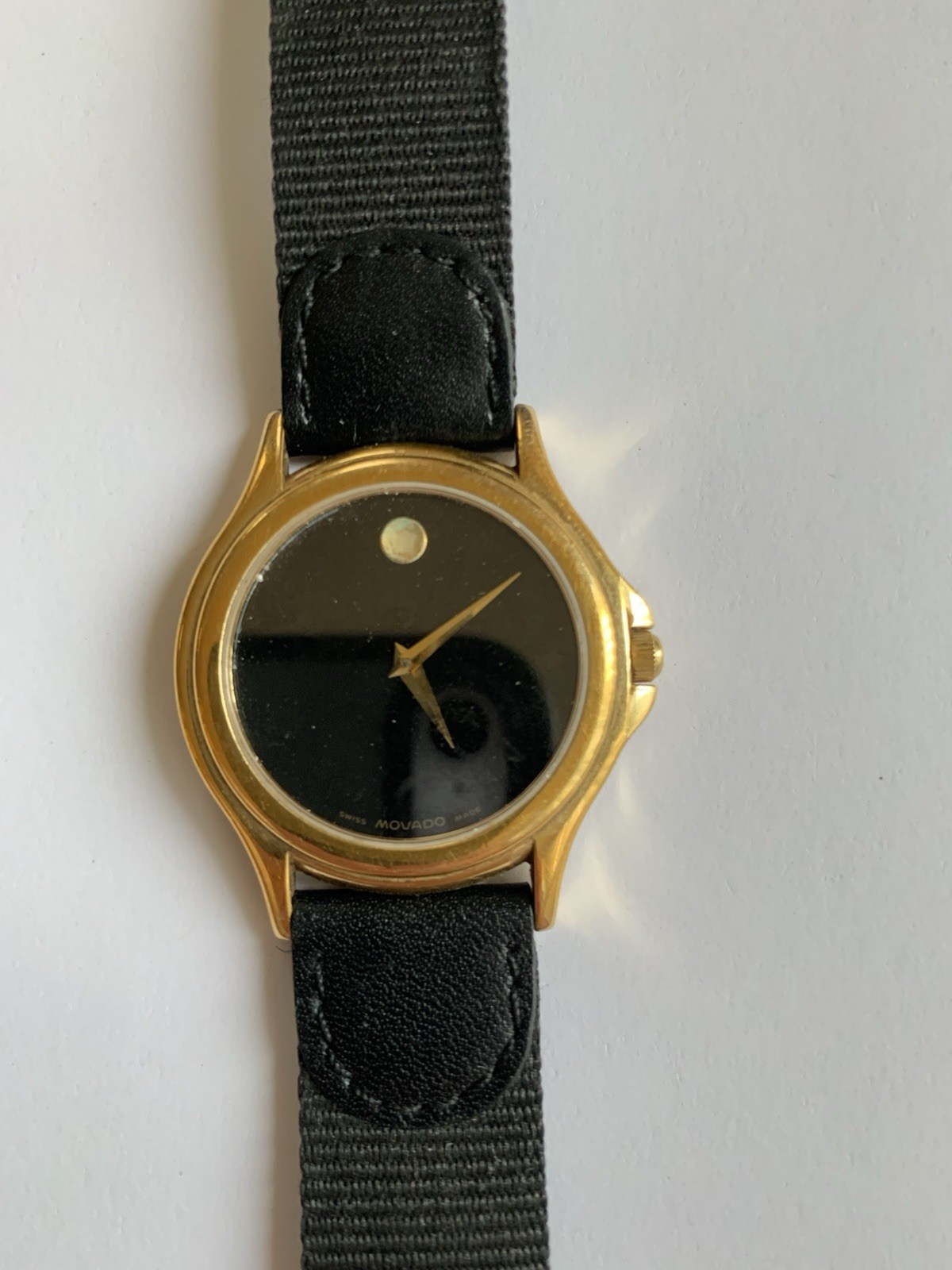 Movado Swiss made Sapphire Crystal Quartz Watch. Working-needs battery