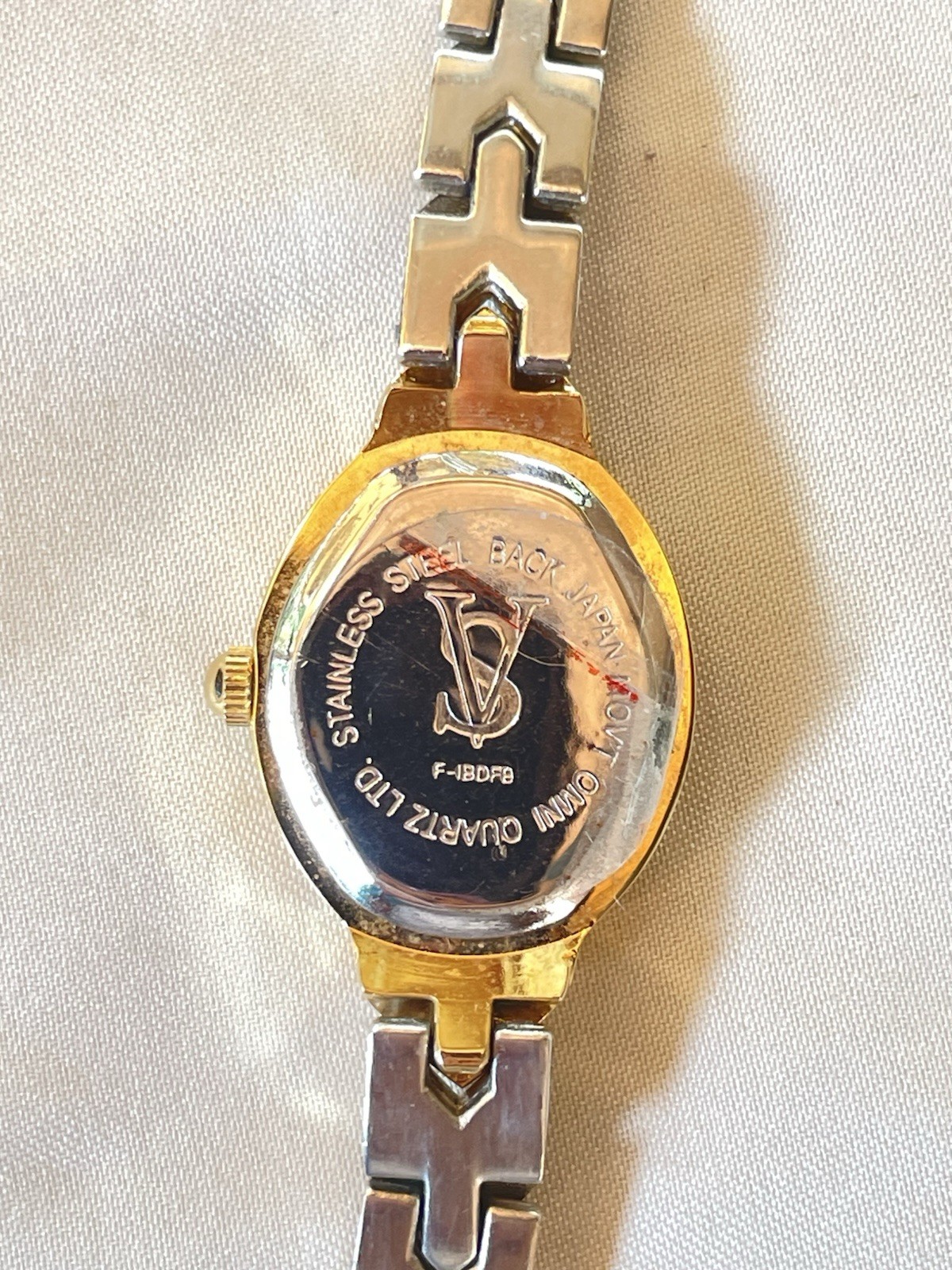 Vintage Sergio Valente Women’s Oval Quartz Analog Wristwatch Two-Tone Gold Dial