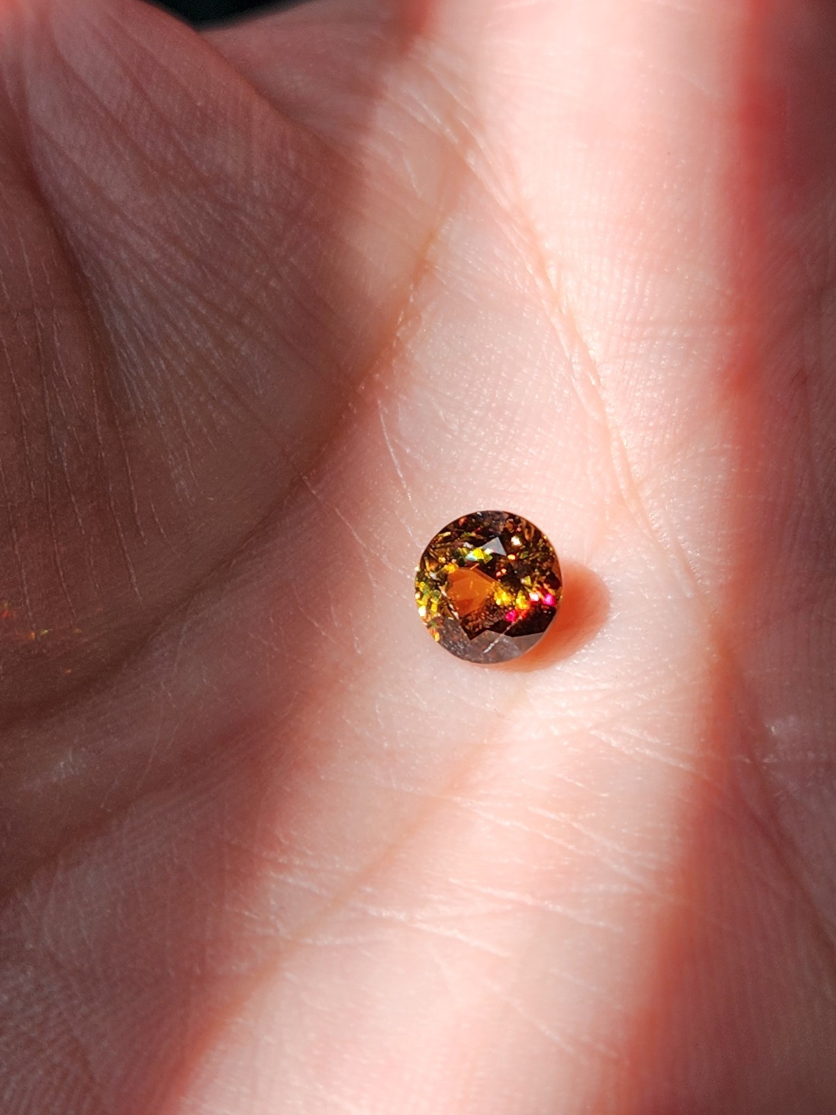 Sphene 7.18mm x 6.88mm x 4.30mm Oval 1.47ct Loose Gemstone