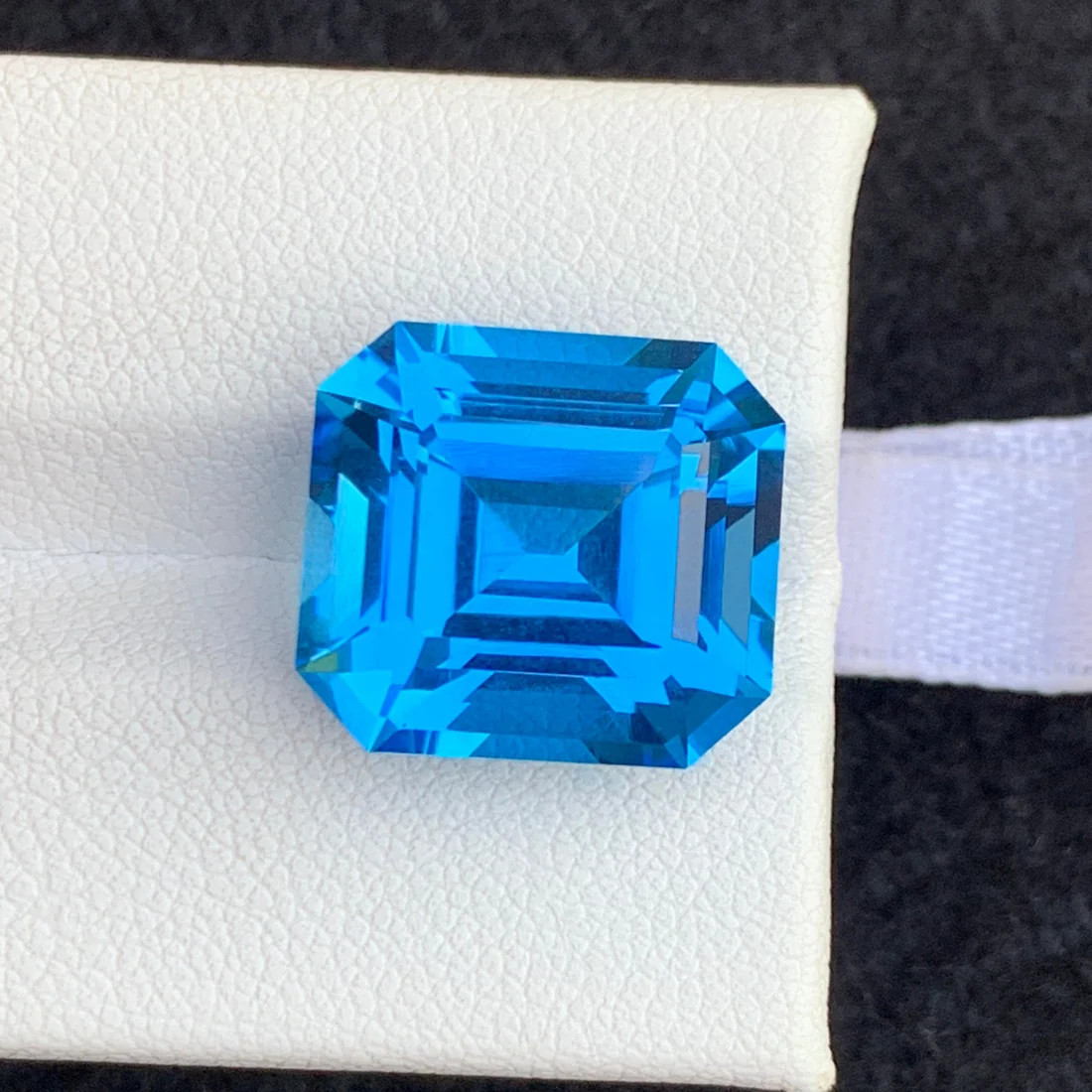 16.70carat Natural Electric Swiss Blue Topaz With emerald cut origin from Afric