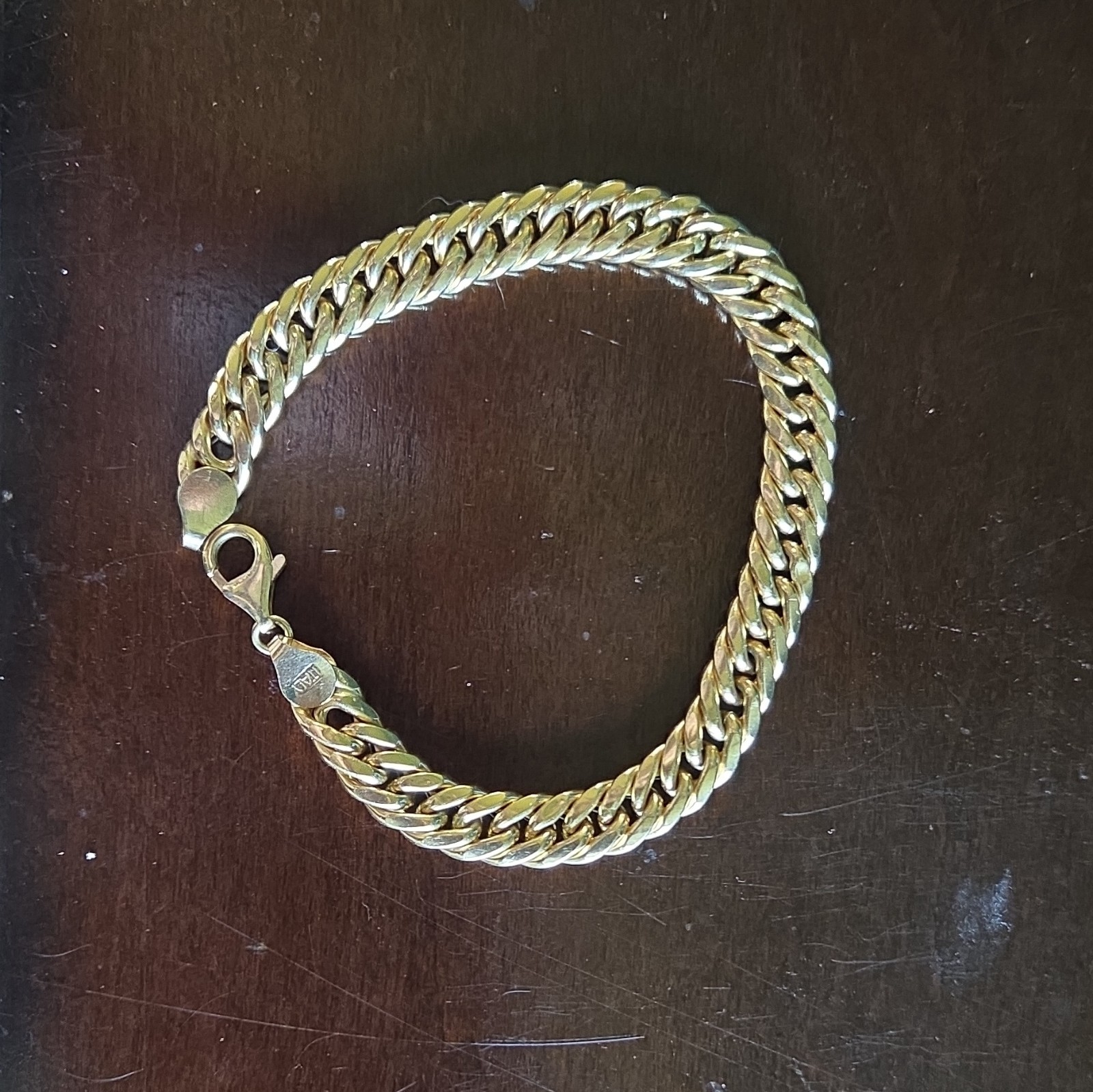 18K Yellow Gold 10mm Curb Link Chain Bracelet with Lobster Clasp 8 in. 8.72g.