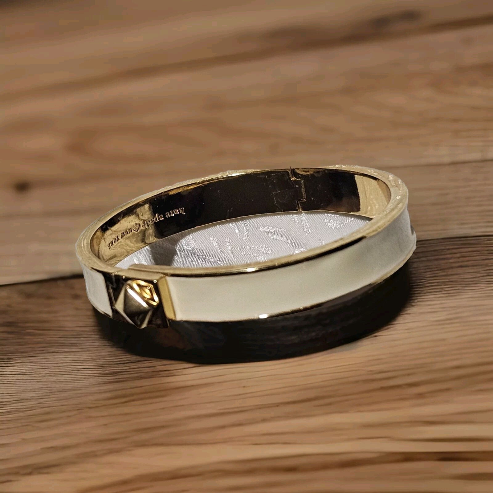 Kate Spade Signed Gold Tone Cream Enamel Turn Lock Hinged Bracelet