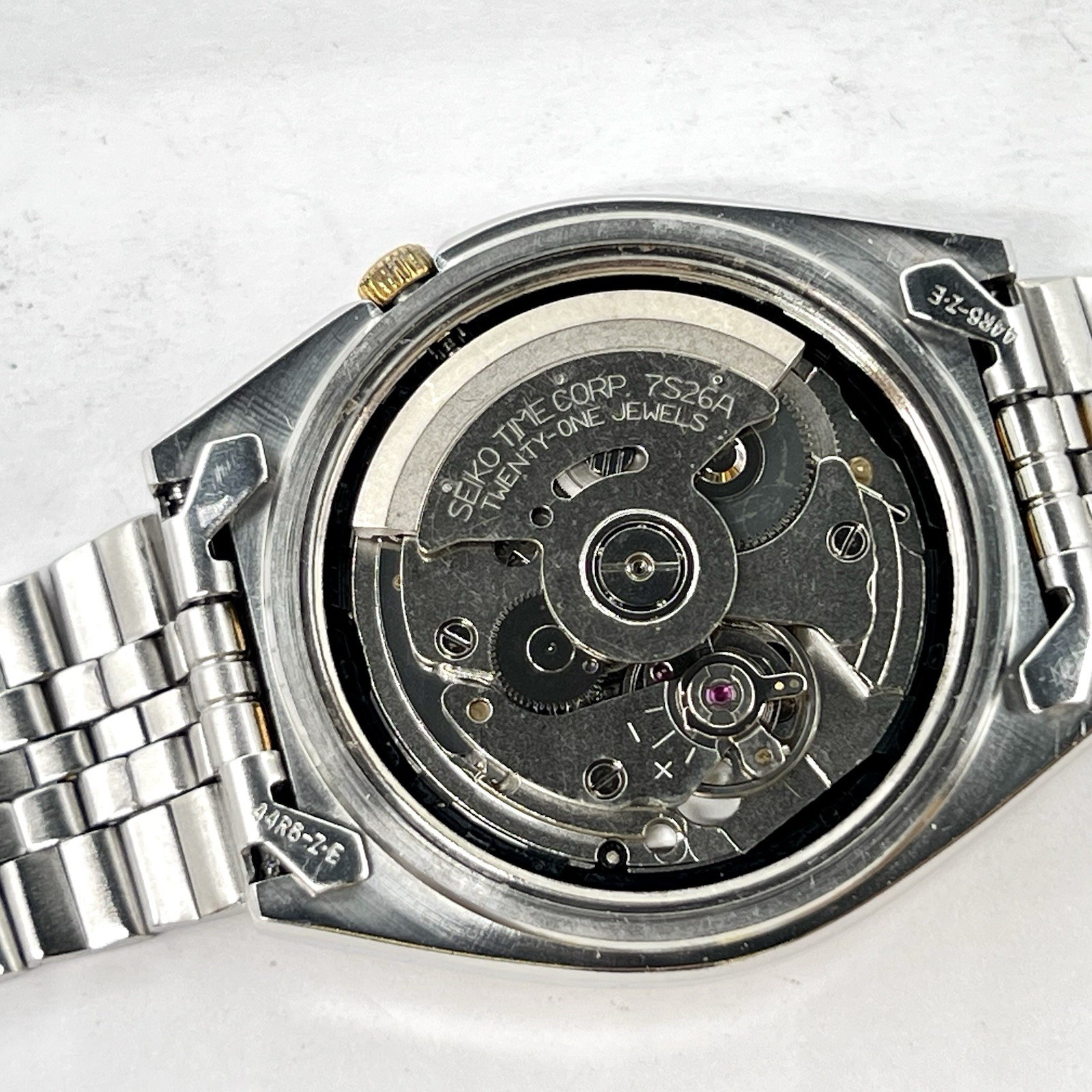 Seiko 5 Automatic Day/Date Steel Gold Tone White Teaked Dial 38mm Watch SNX166