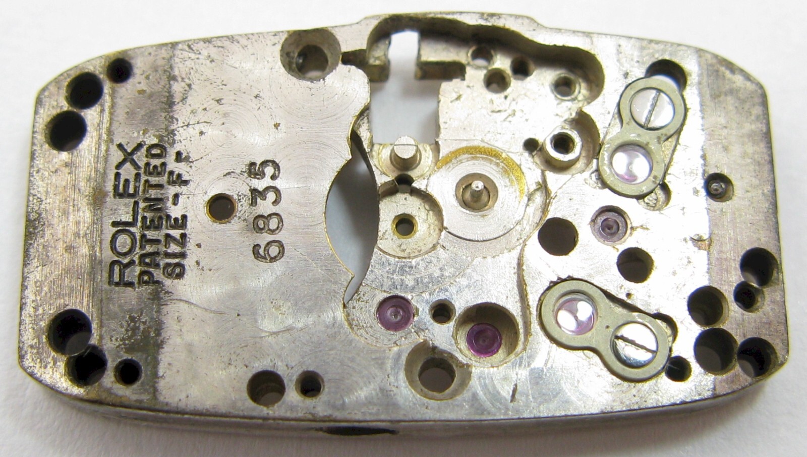Rolex 180, F Watch Movement Part: main plate #100