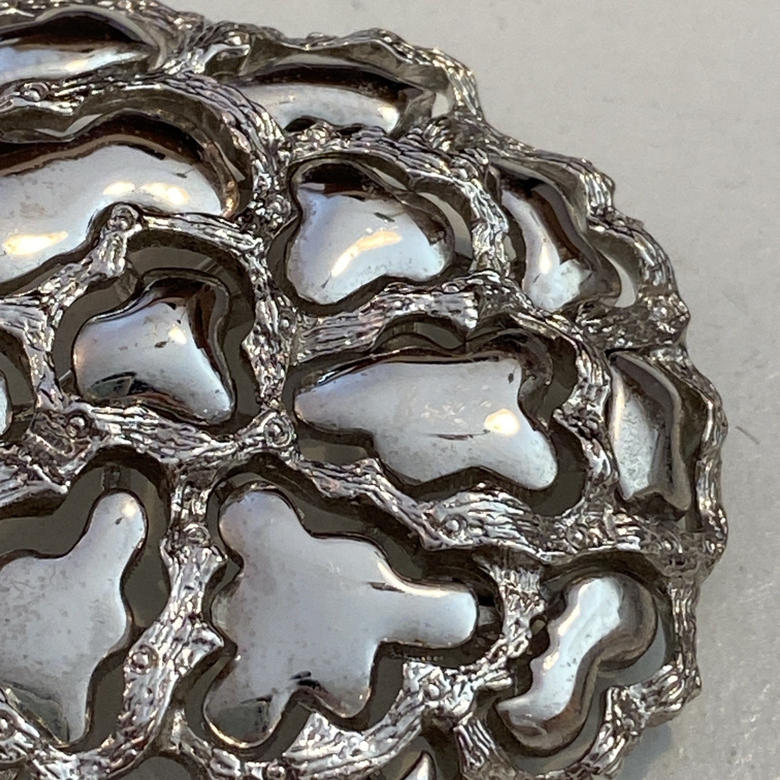 Vintage Roget TM Silver Tone Metal Modernist Perforated Pattern Branch Shiny Pin
