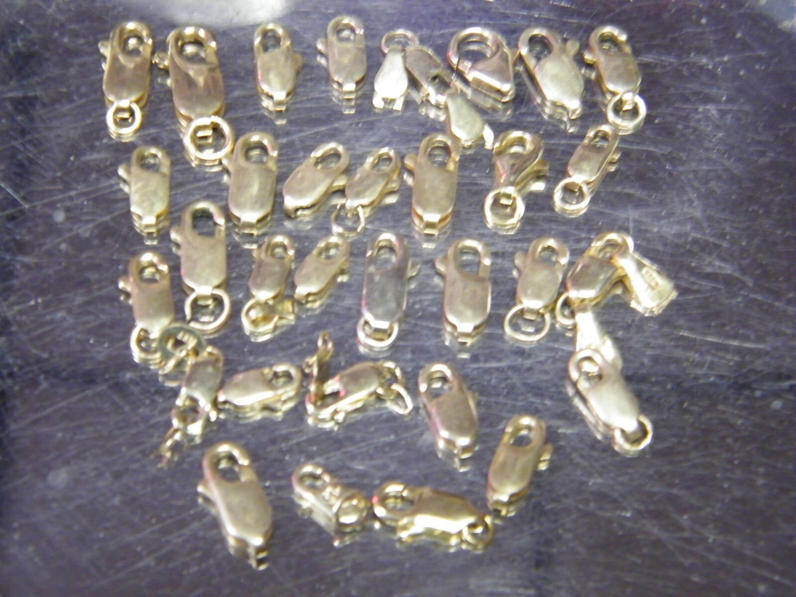 14 kt Solid Gold Lobster Clasps 32 Items 17.0 Grams – 14k