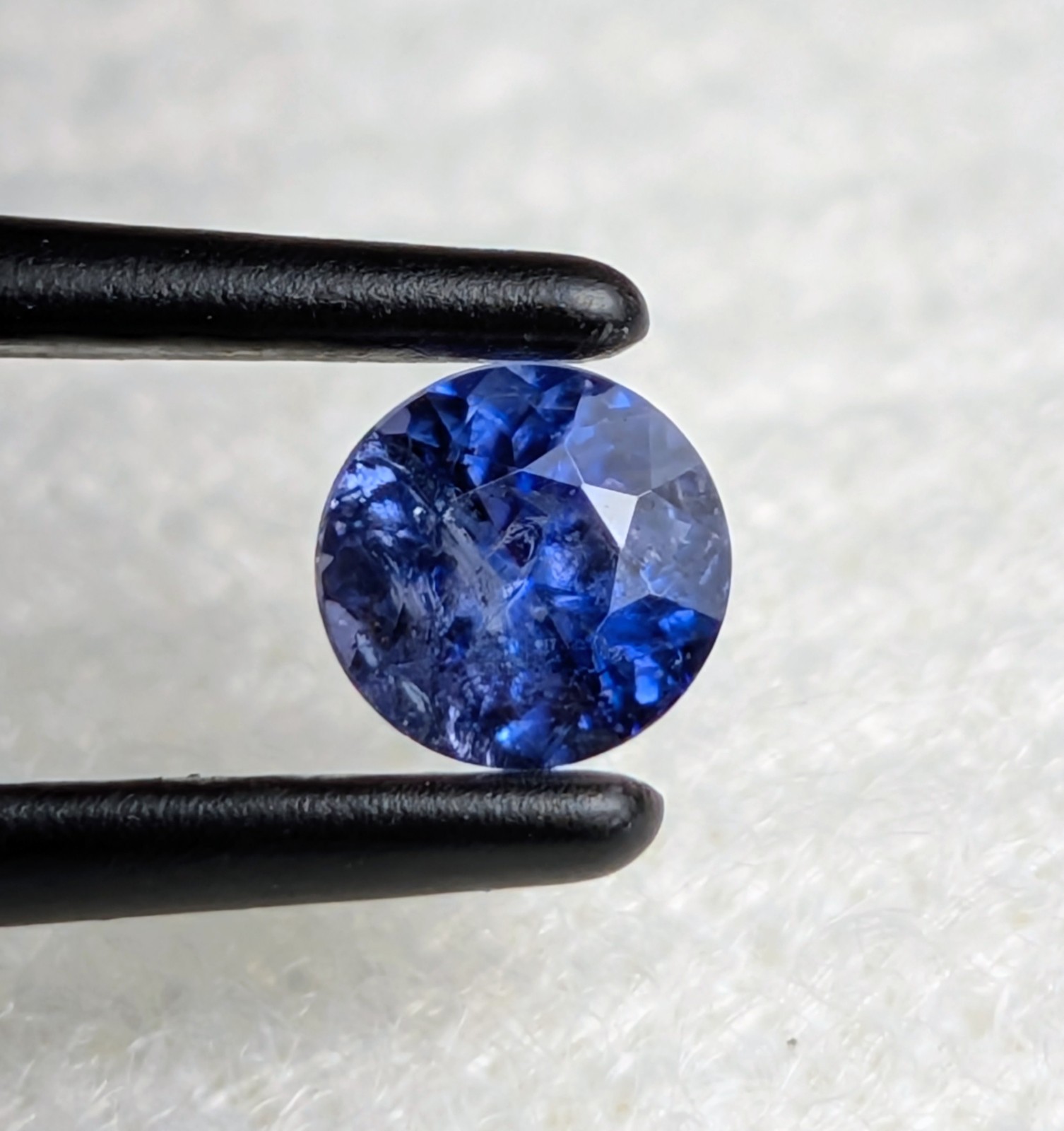 Benitoite: I, round gemstone 0.24 ct