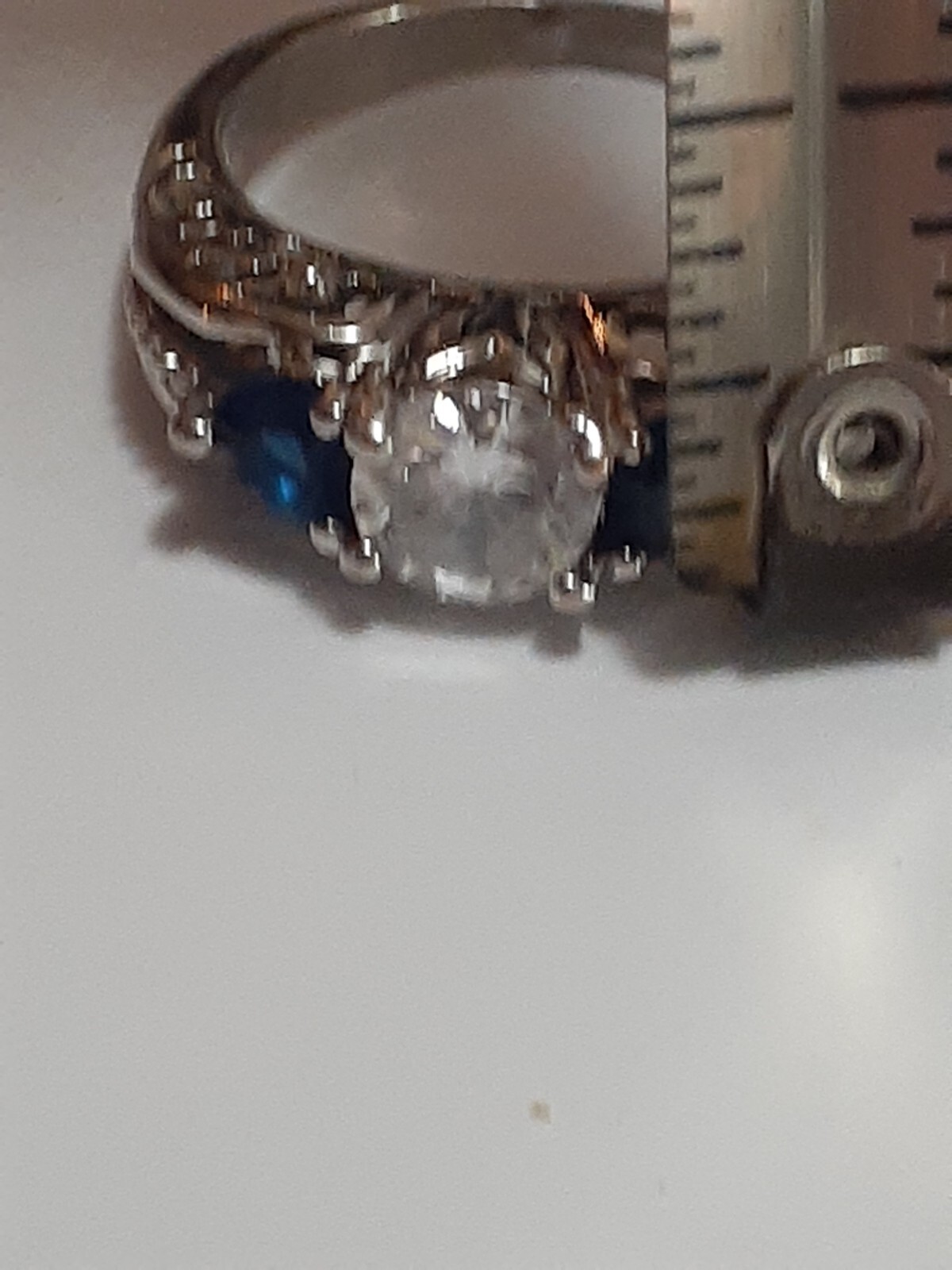 blue & white/colorless prong set stone trio Silvertone ring size 6.5