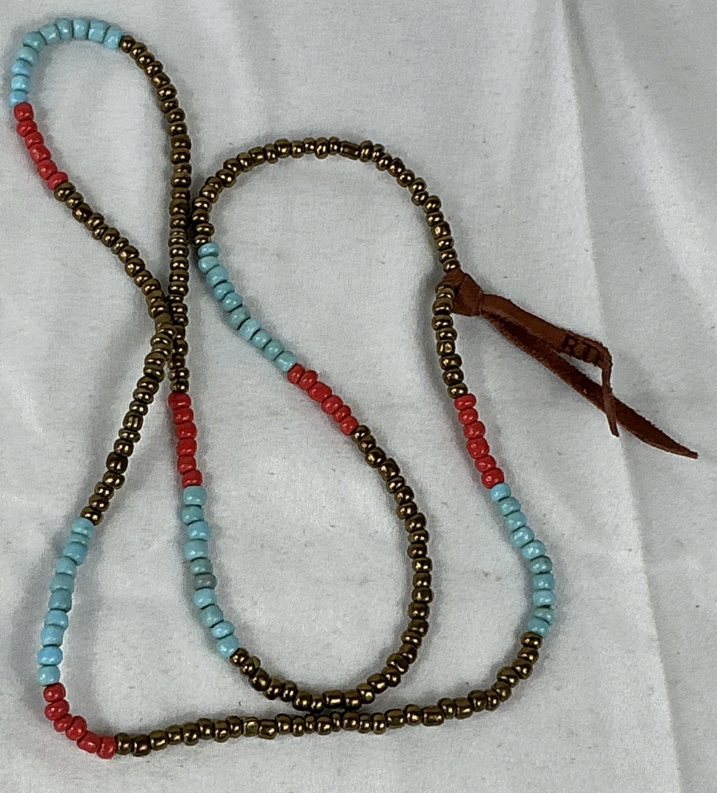 RTH Brass Blue & Red Glass Beaded Leather Knot Necklace 28” Length