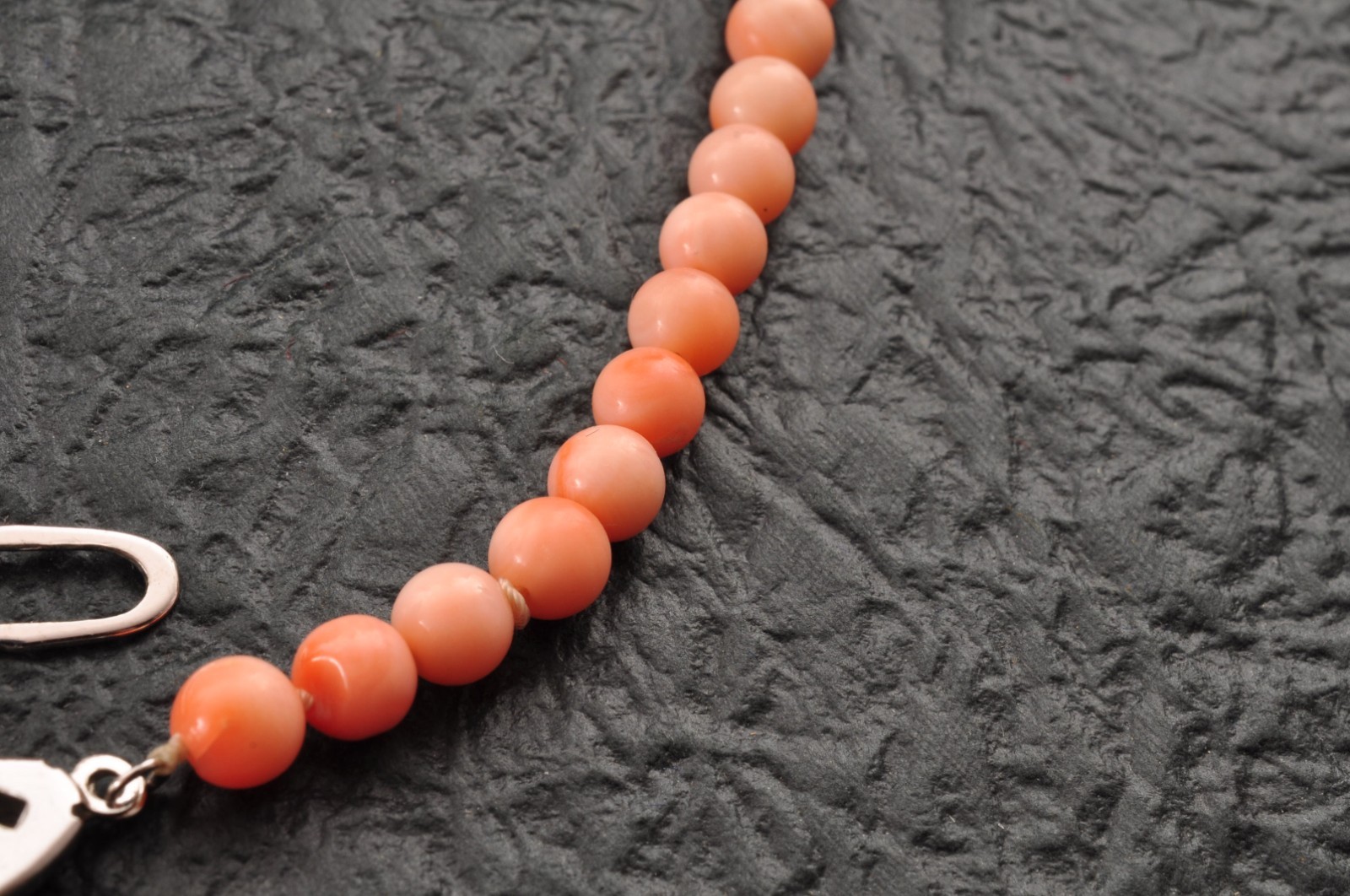 Salmon pink coral Necklace and ear clip set (total 116ct) with Certificate case.