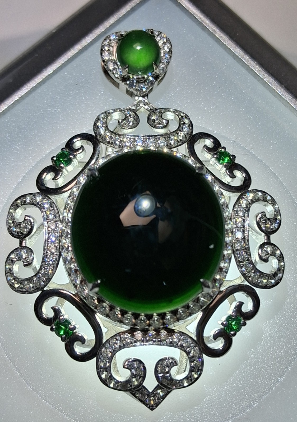 Silver Tone Ornate Scrollwork Oval Pendant Green Oval Cabochon & Accents