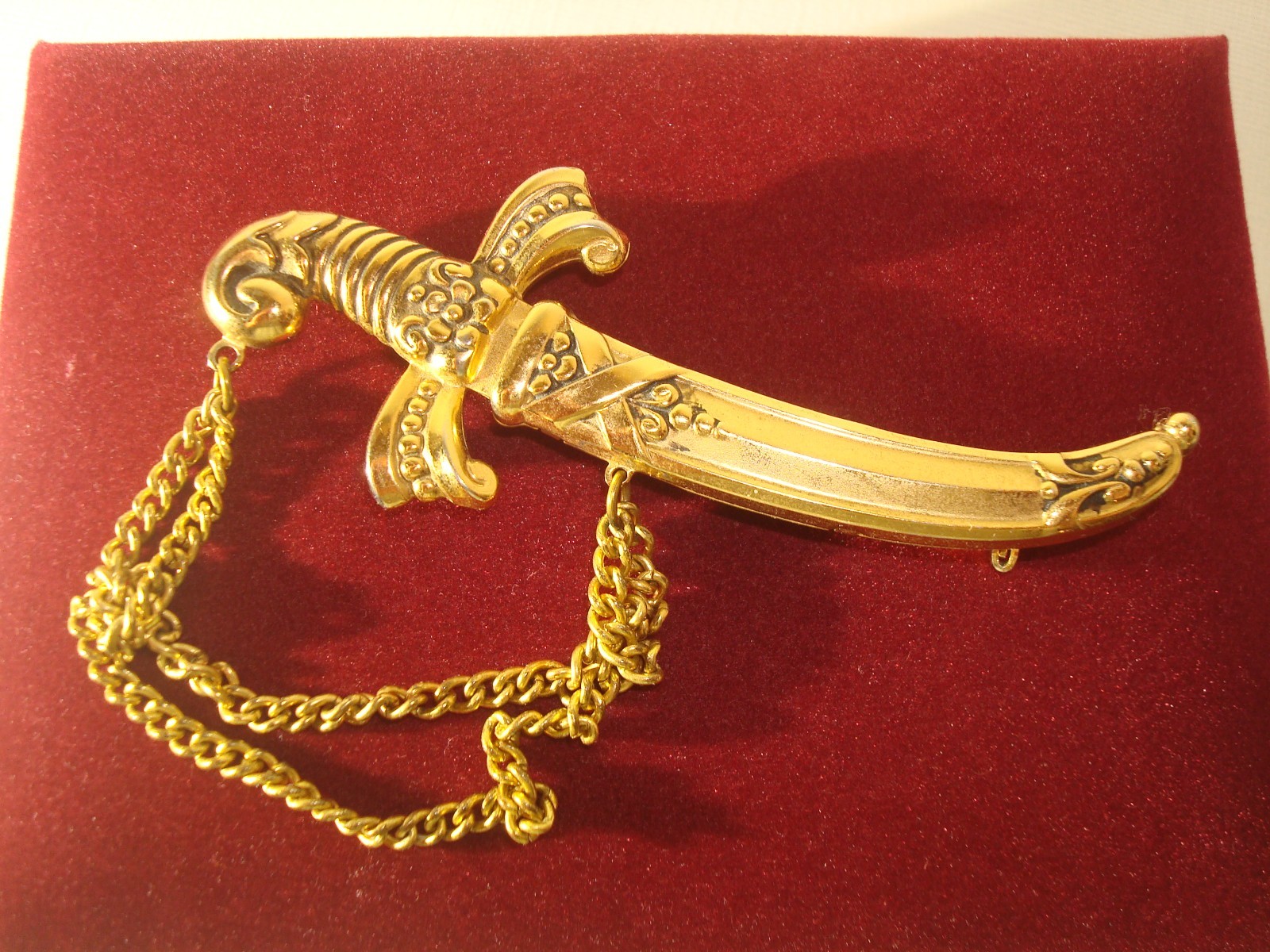 VINTAGE LOT(3) BROOCHES,CHINESE DRAGON,J.J RUSSIAN CATHEDRAL,M/EAST DAGGER PERF.