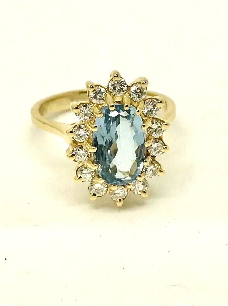 2.15 Carat Oval Blue Topaz & Diamond Halo Ring 14 k YG w/Card Appraisal – Size 6