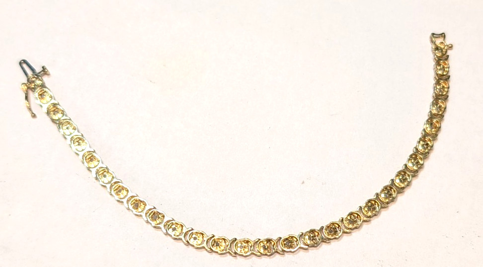 10K YELLOW GOLD DIAMOND TENNIS BRACELET 7.50 INCHES LONG & 6.50 GRAMS