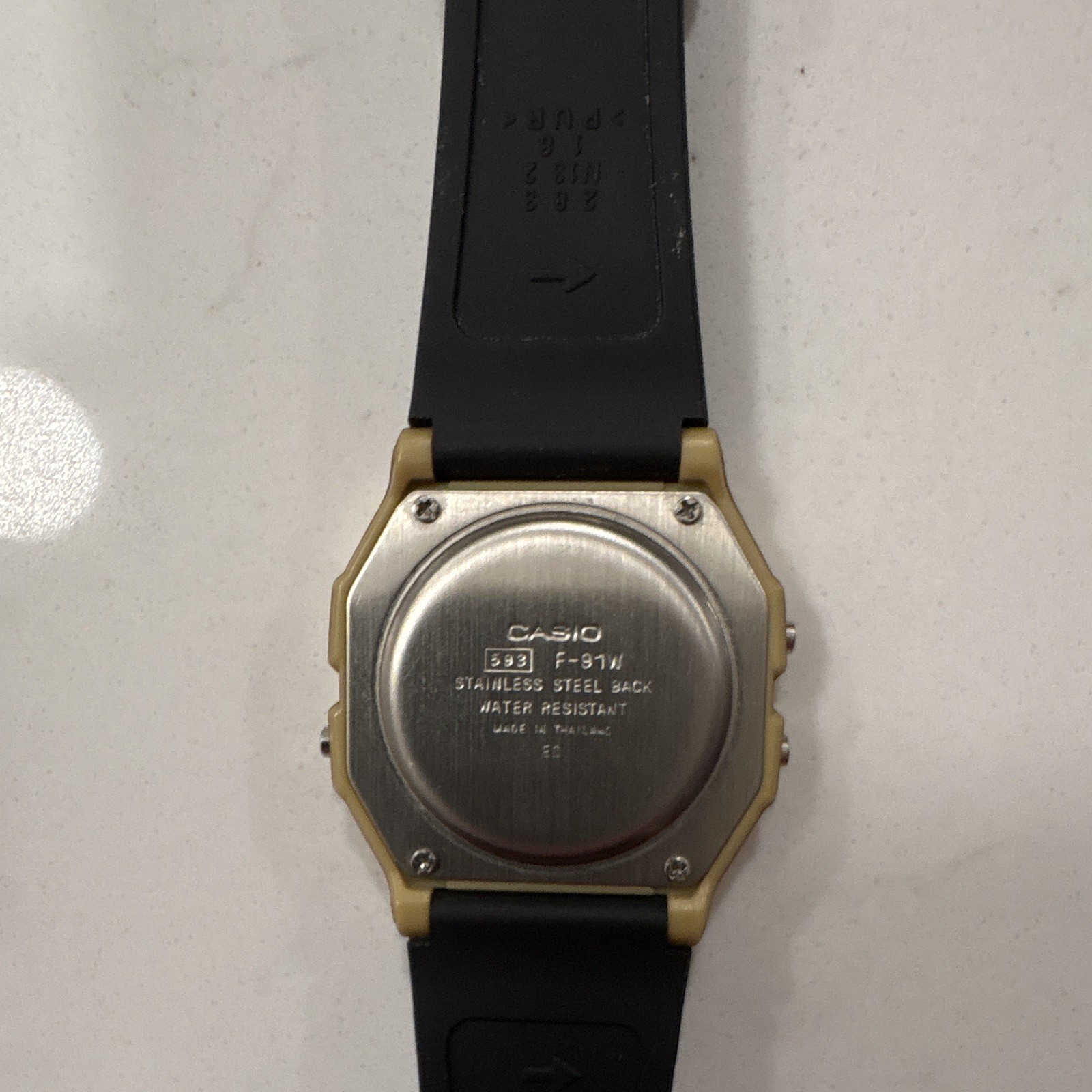 Casio F-91W Quartz Digital Water Resistant Gold Case Black Resin Strap 33mm