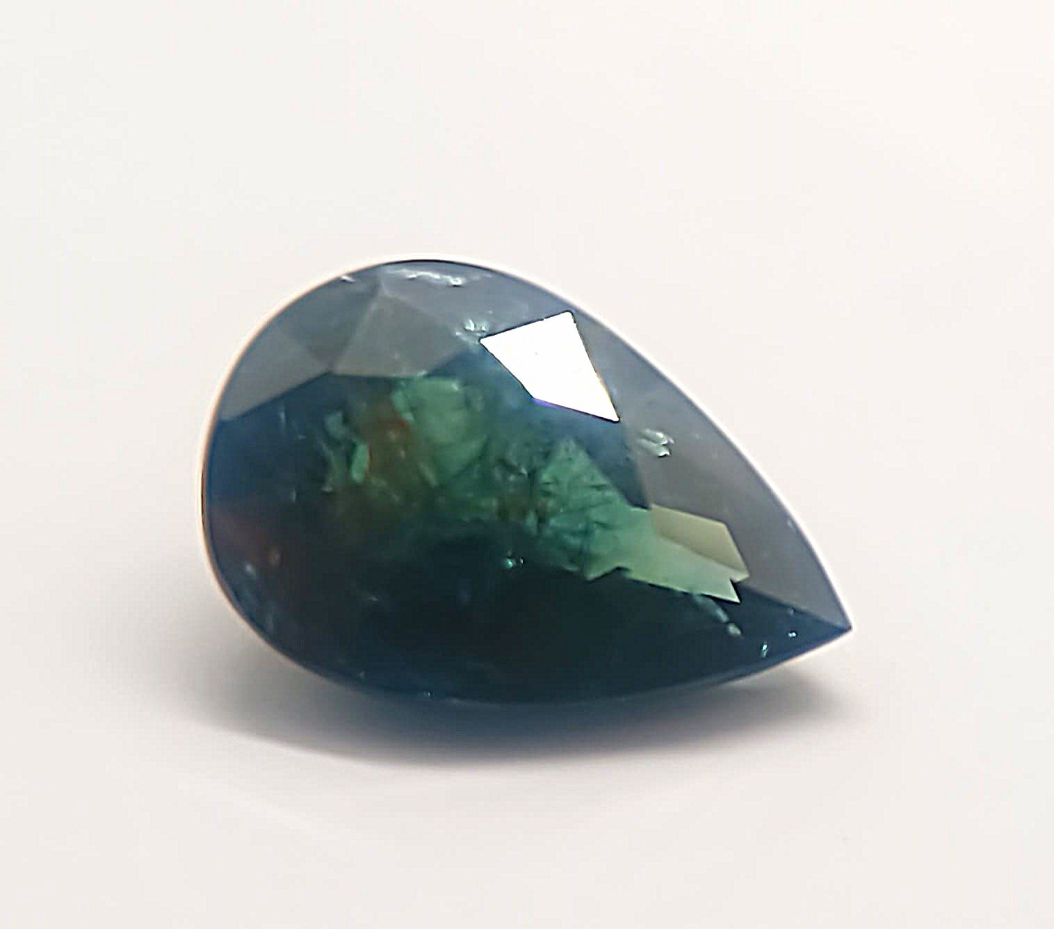 AUSTRALIAN OCEAN DEEP NAVY BLUE-Green SAPPHIRE 1.36ct Pear Tasmanian Plant Insid