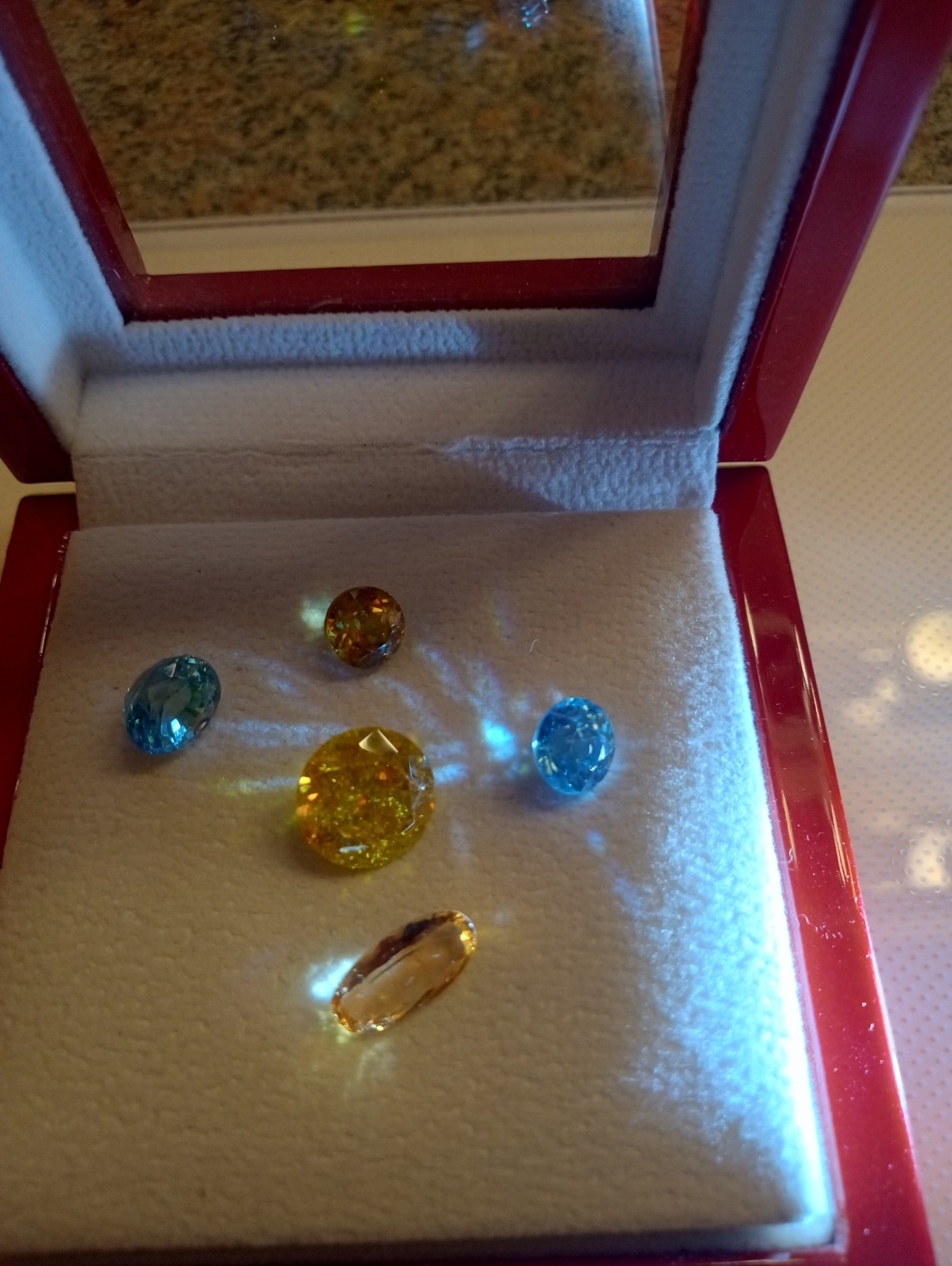 Lot of 5 Loose Gems. 2 Blue Zircons, 1 Sphene, 1 Imperial Topaz, 1 Sphalerite