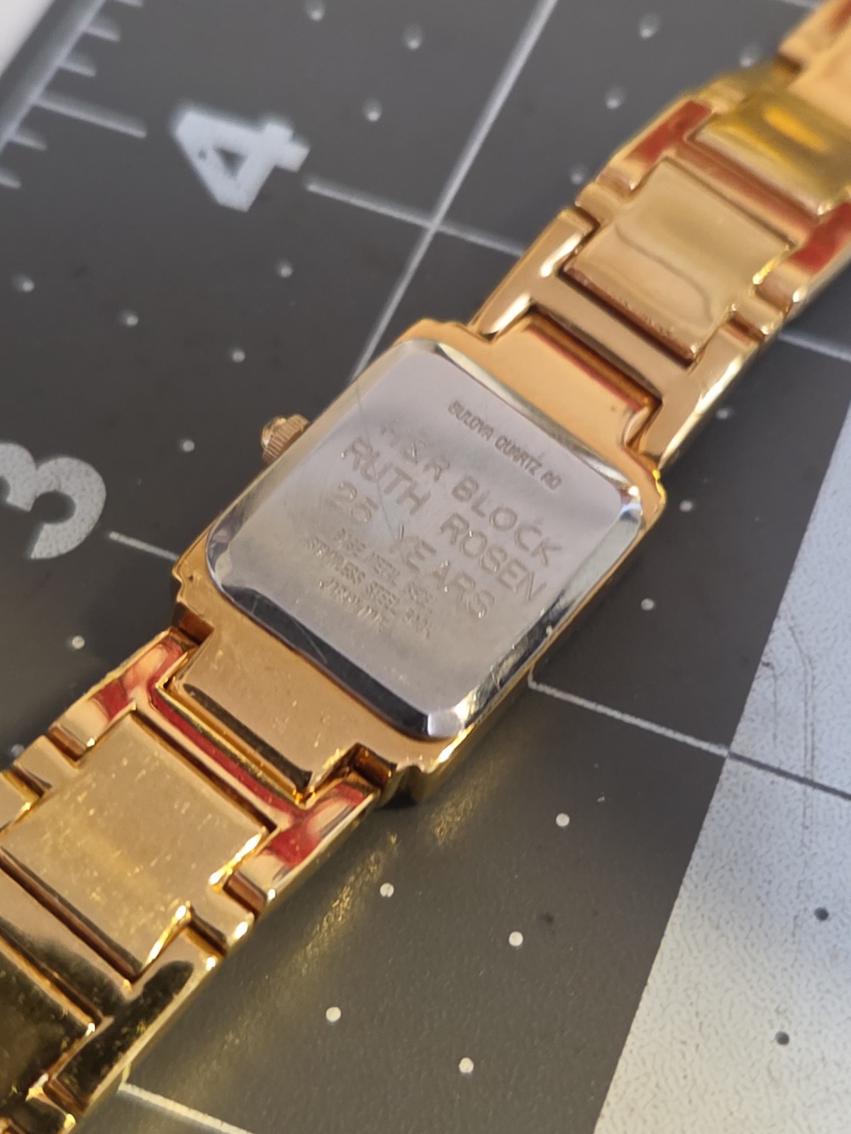 Vtg 2000 BULOVA Ladies 16mm Watch Gold Tone DIAMONDS Bezel MOP Tank 7.5″ – RUNS