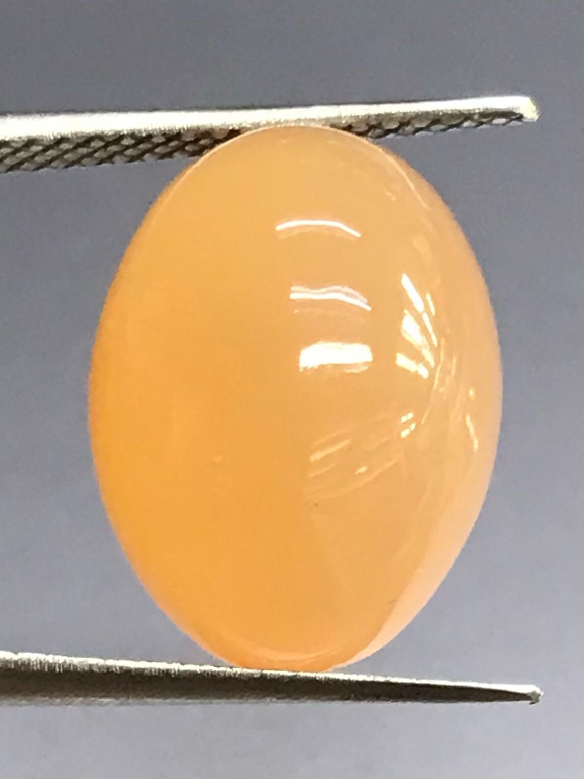 15.56CTS 18X13X9MM Orange and brown moonstone loose gemstone cabochon