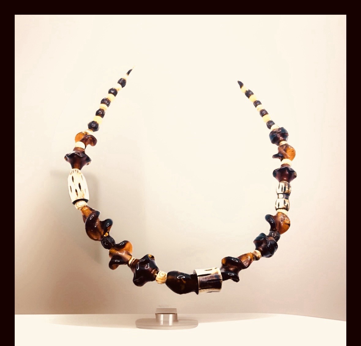 Safari Necklace dark, swirling resin or glass beads, bone/horn cylinders Tribal