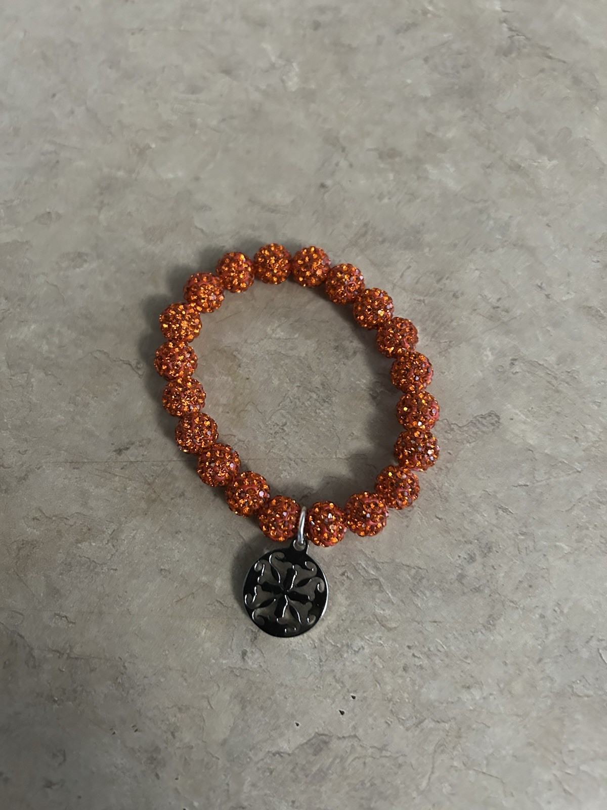 Rustic Orange Stretch Beaded Bracelet With Logo Charm