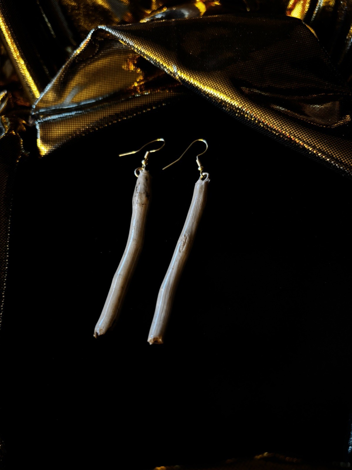 One of a kind jewelry made from real pieces of wood coated in resin