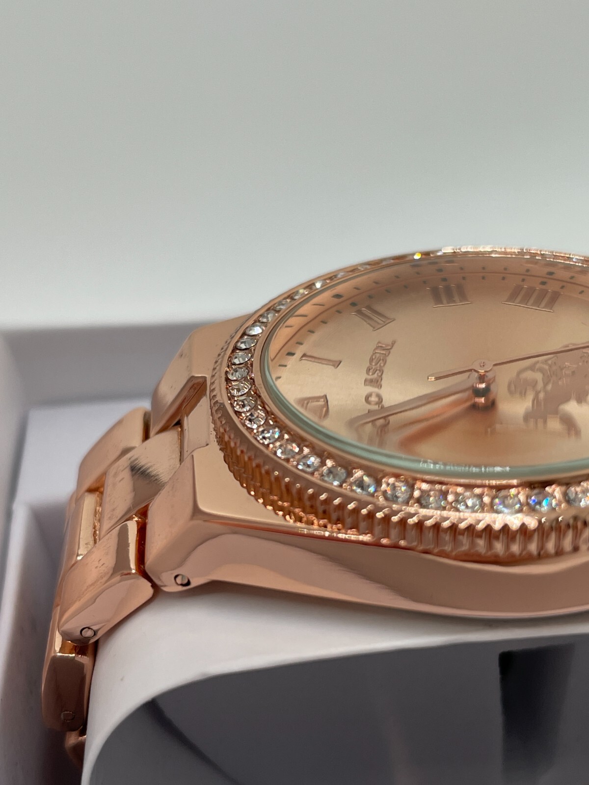 U.S. Polo Assn. Womens Rose Gold Tone Roman Numerals Analog Round Wristwatch