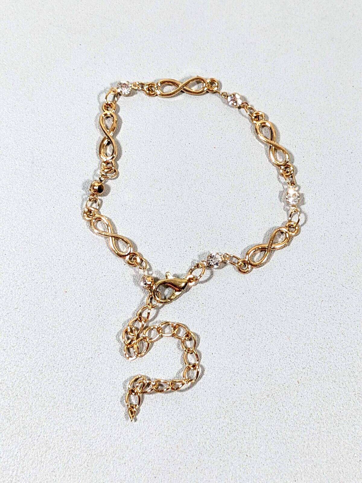 Gold Tone Infinity Clear Crystal Tennis Bracelet 10 inches