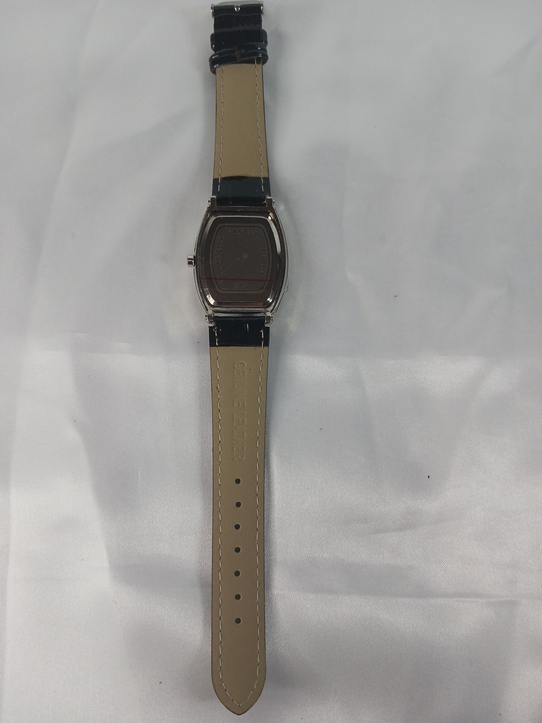 New Quartz watch. Tonneau / Barrel Case Shape. Roman Numerals