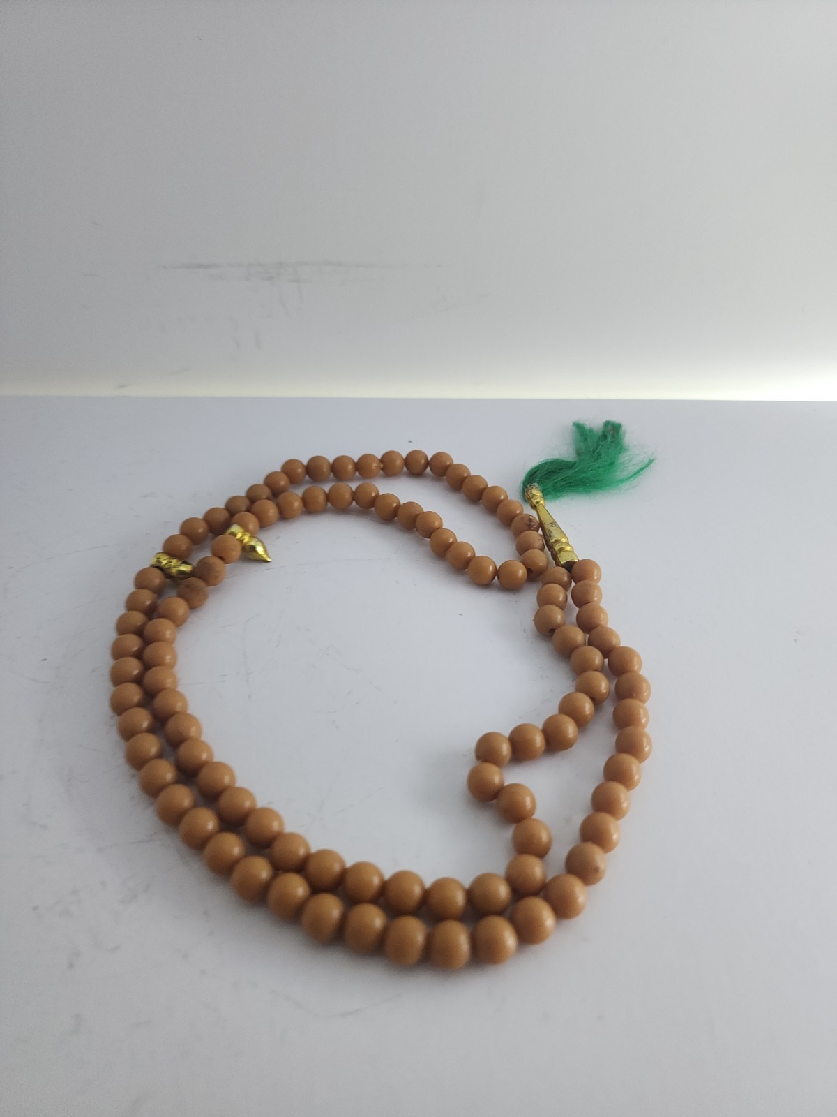 Brown Beige Beads Necklace Meditation Souvenir Green Tassel Gold Tone Charm