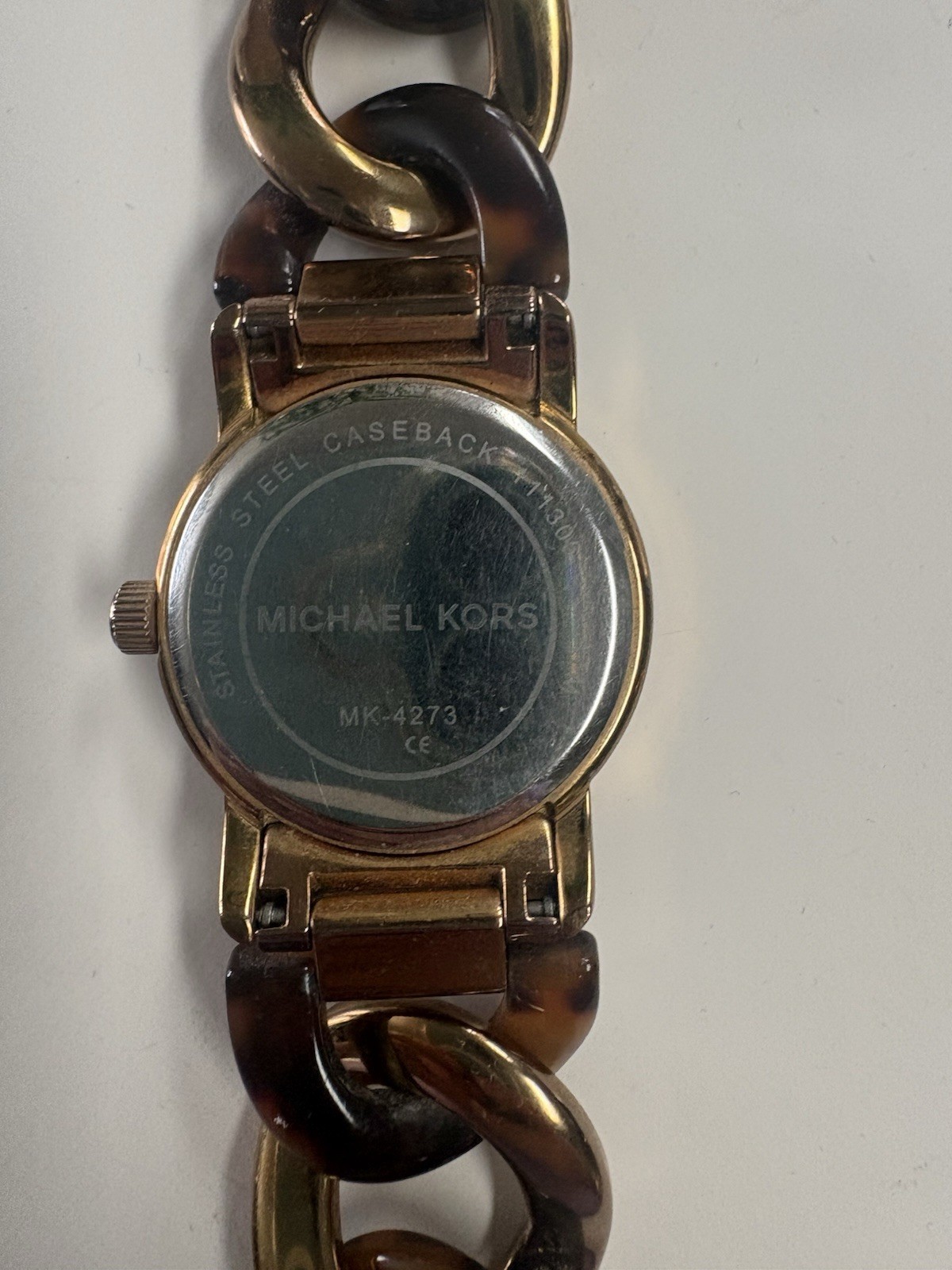 Michael Kors MK-4273 Women’s Runaway Twist Analog 30mm Brown/Gold Bracelet Watch