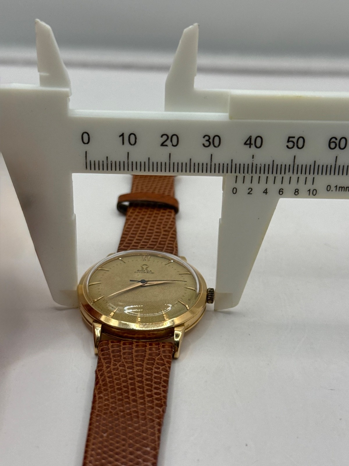 Omega Automatic 18kt Solid Gold Watch.