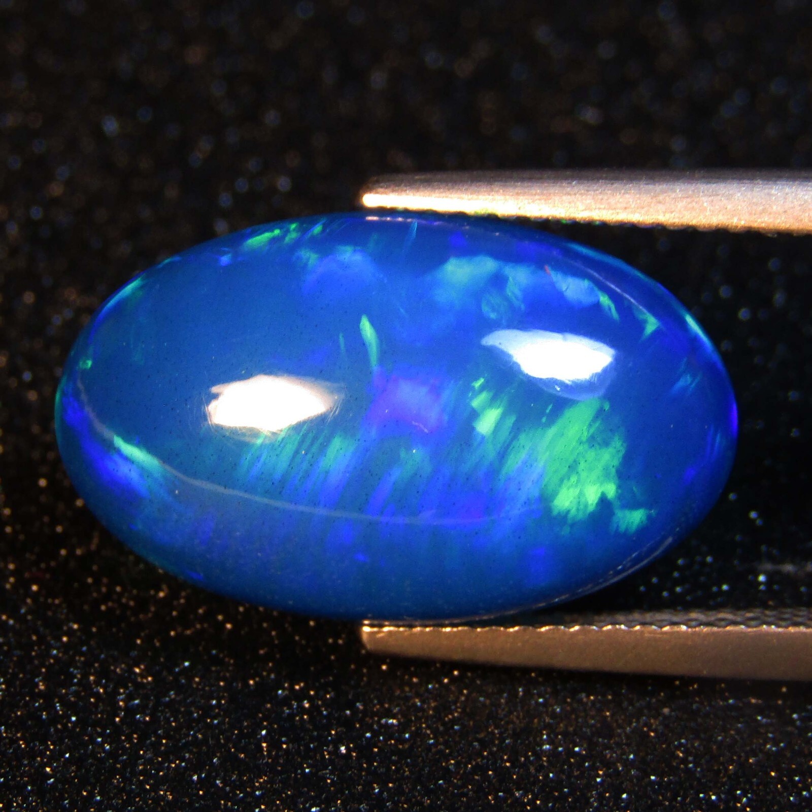 7.16Cts Natural Color Play Ethiopian Blue Opal Oval Cabochon Loose Gem