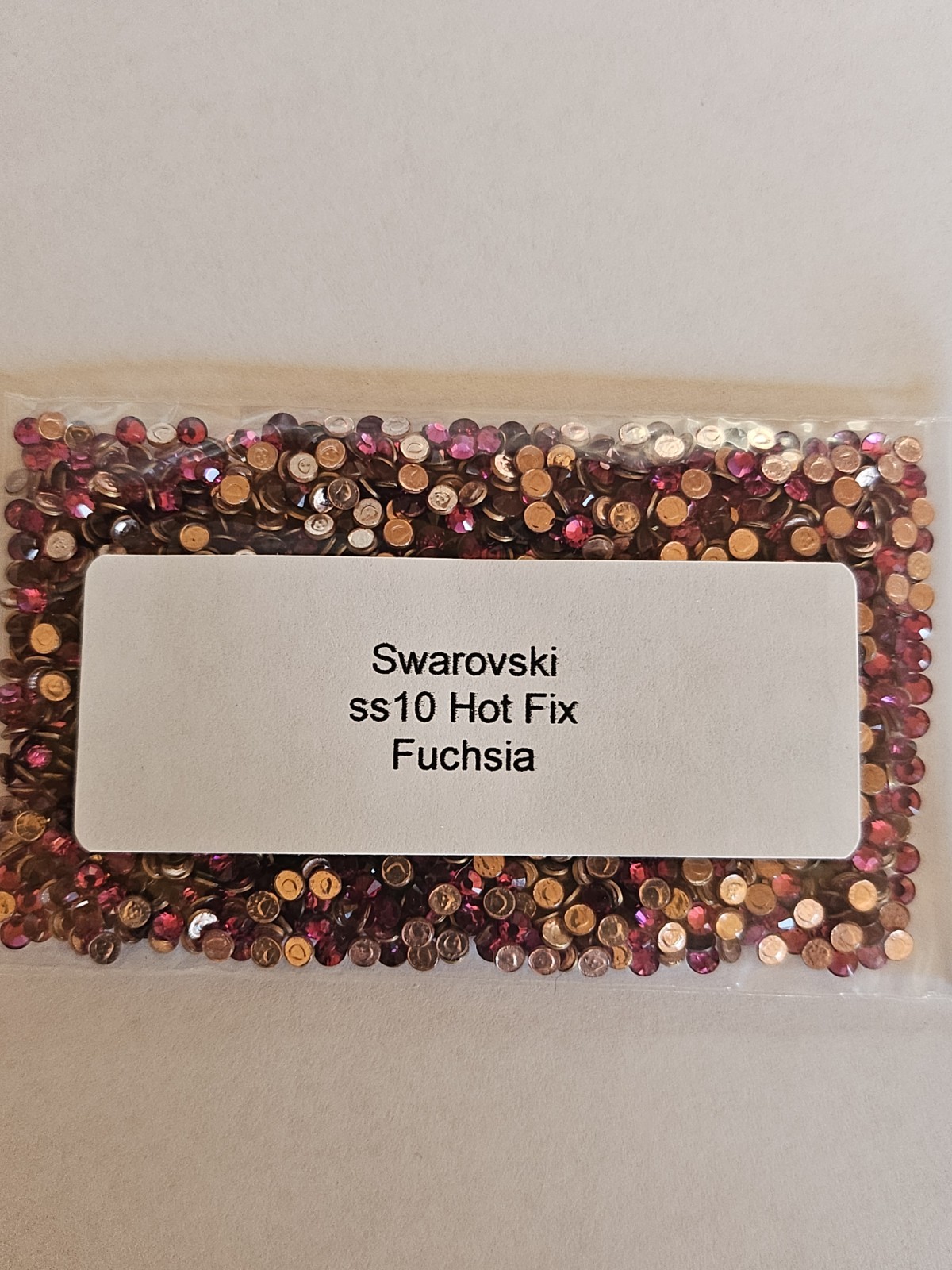 Genuine Swarovski ss10 Hot Fix Crystals in the color LIGHT COLORADO TOPAZ
