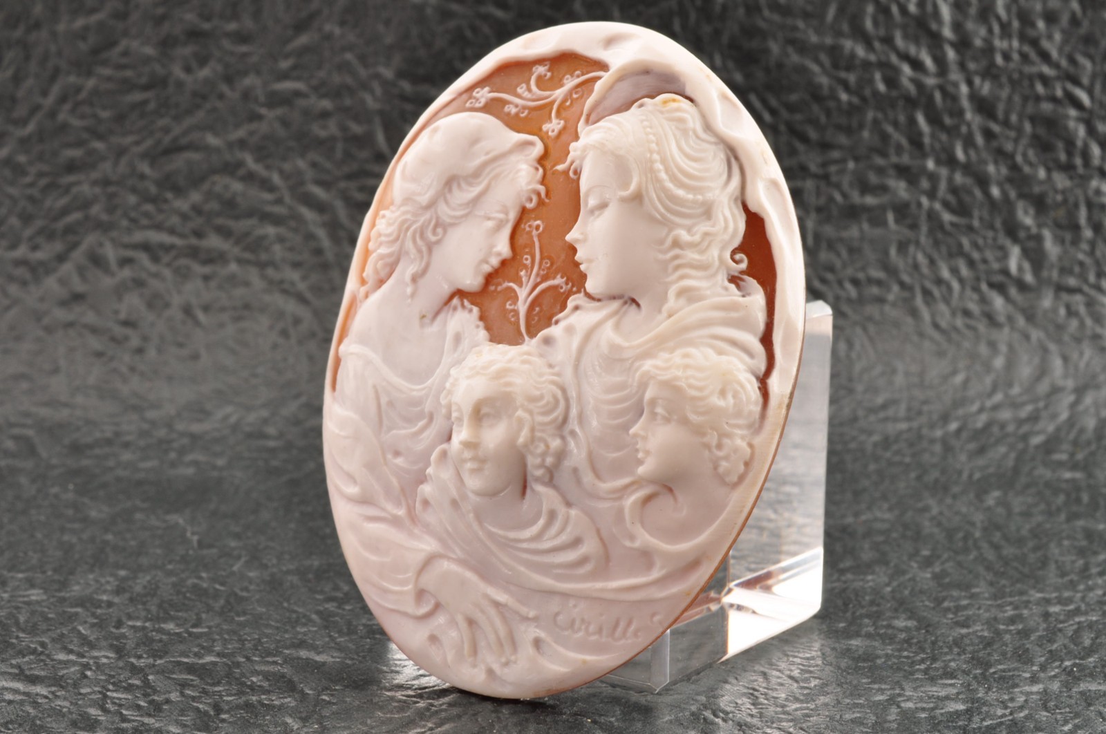 Vintage oval shape shell cameo “Brothers and Sisters” (115.0ct), sign by artist.